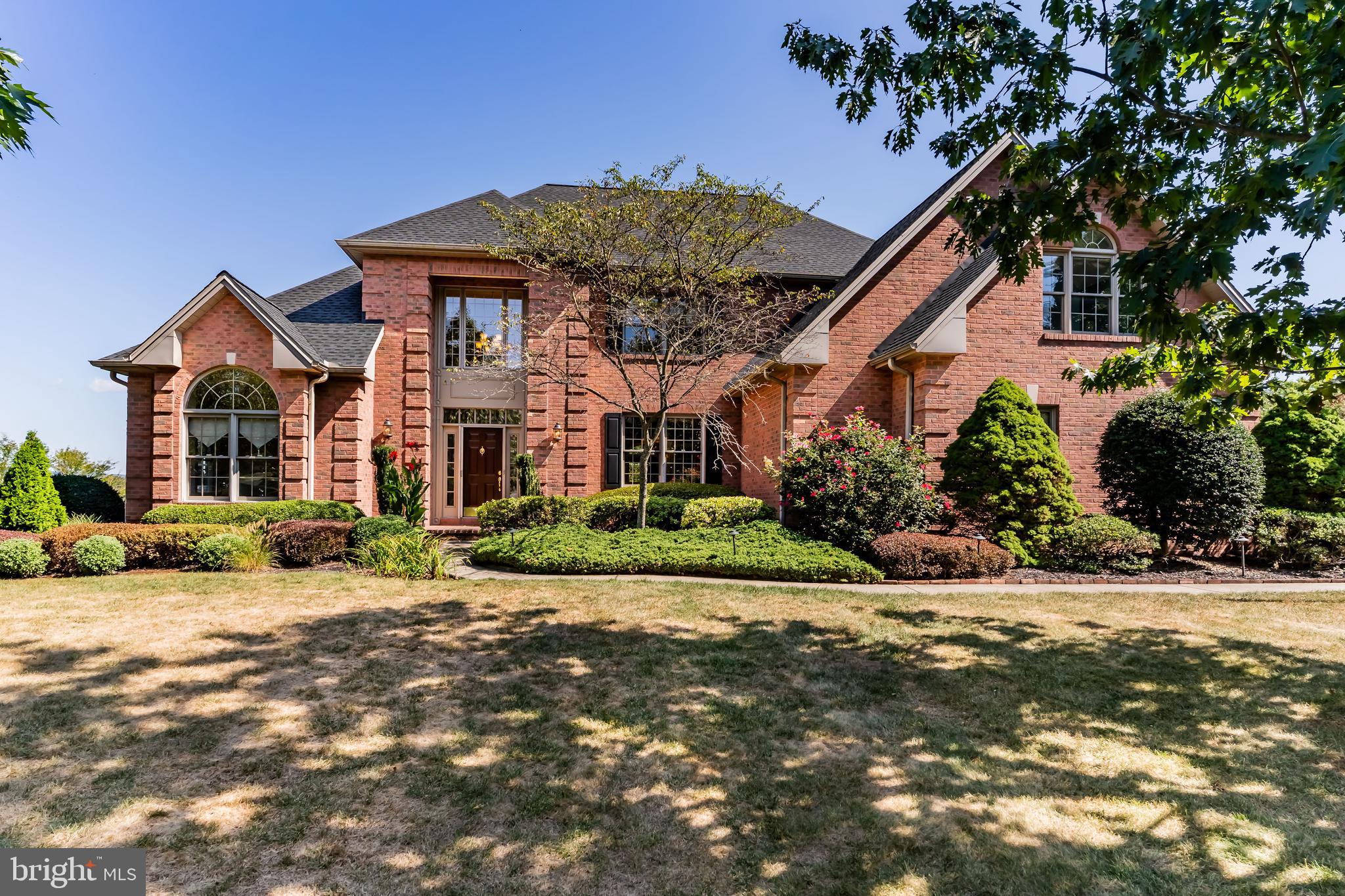 Welcome to 7 Accent Circle, a stunning residence tucked away at the end of a quiet cul-de-sac in the highly sought-after Floribunda neighborhood of Camp Hill. Situated on a manicured and matured double lot, this impressive home offers over 4,500 SF of finished living space, designed for both everyday comfort and effortless entertaining. The side yard is a true retreat, featuring a sparkling in-ground pool, built-in gas grill under a pergola with retractable canopy, and an outdoor bar complete with a convenient “service window” for hosting family and friends. The fun continues indoors with a finished exposed basement boasting a full wet bar, a full bathroom designed for pool guests, and plenty of unfinished space for storage. The main floor welcomes you with a formal dining room, a kitchen with breakfast area that has deck access with a retractable awning, and abundant cabinetry plus a built-in desk. The kitchen opens to a cozy living room with built-in wall unit and gas fireplace. A unique highlight of the main floor is the in-law suite, which includes a bedroom, full bathroom with stall shower, private kitchen, sunroom overlooking the pool, and its own deck—perfect for extended family or guests. Upstairs, the expansive primary suite impresses with a two-sided gas fireplace, a spa-like en suite bath with dual walk-in closets, double vanity and jetted therapeutic tub. Two additional bedrooms and another full bath complete the second floor. 2 of the 3 bedrooms upstairs have extra storage, be sure to check it out! Additional conveniences include an oversized two-car garage with extra room for lawn equipment storage, mudroom with built-ins and utility sink, and thoughtful details throughout. Located in one of Camp Hill’s premier neighborhoods, you’ll enjoy a serene setting just minutes from top-rated schools, Siebert Park, the Camp Hill Pool, West Shore Country Club, and all the dining, shopping, and conveniences of downtown Camp Hill and nearby Harrisburg. Don't wait, schedule your private tour today!