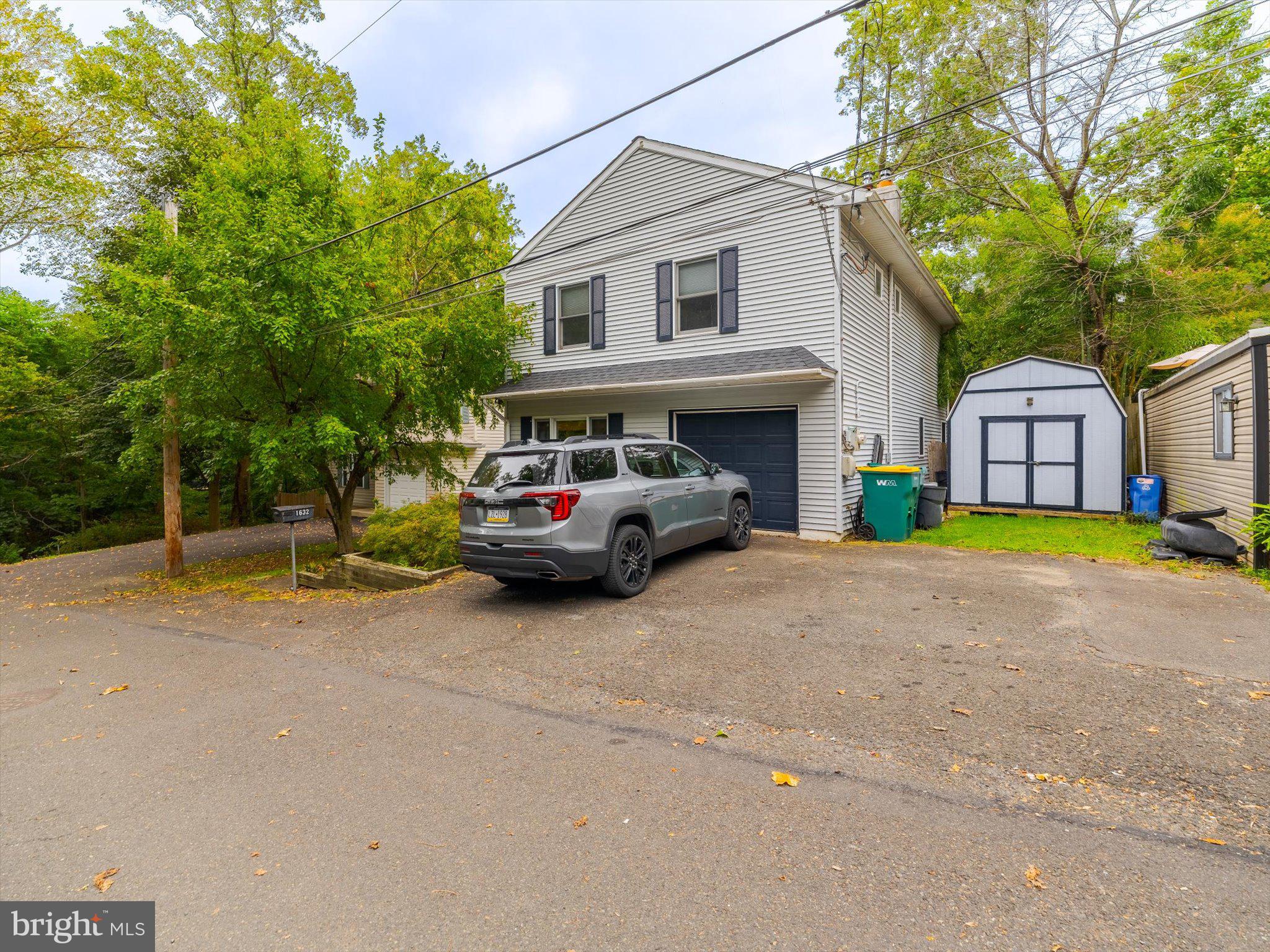 Amazing and Rare opportunity to own a 3 bedroom, 2.5 bathroom single Langhorne home in the
Neshaminy School District!!! This Beautiful unique home gives you the feel of a mountain
house, but it is nestled in the woods of Langhorne giving you the best of both worlds.
From the moment you walk into the open Foyer with vaulted ceilings of this home you will fall in love. The first floor has a large family room with built-in shelves that is currently used as an
office. There are two generous sized bedrooms on this floor with one of the
bedrooms giving you access to the backyard. There is a full bathroom, a Laundry Room, and access to the 1
car garage on this level. As you walk up the staircase to the upper level you will immediately feel
the warmth and inviting feeling of the open floor plan. This large open space is divided into three areas, with a Living/Great Room featuring a full wall brick fireplace to keep you warm during those cold winters days & nights, a Dining Room, and the spacious Kitchen with an Island bar. The main bedroom with an en suite bathroom is also on this floor as well as the powder room. The vaulted ceilings with exposed beams, ceiling fans, skylights, breakfast bar all add to the instant attraction of this home. Sliding doors leads to the secluded backyard oasis! An entertainer's dream with double decks with connecting ramp
with two sets of stairs that features three built in bars. The backyard has beautiful shady mature trees, space for a firepit and two gates. There are so many additional wonderful features to the home, a stunning full wall custom wood entertainment center, recessed lighting, Pergo flooring, central vacuum system, newer central air, newer boiler, newer water heater, 1 car garage, 2 car driveway, additional street parking. Make your appointment today!