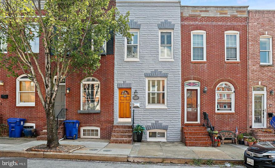 Nestled in the heart of Federal Hill, this charming house offers a unique opportunity to create your dream home. With two generously sized bedrooms and one bathroom, this property is perfect for those looking to put their personal stamp on a well-maintained home.

Step inside, and you'll be greeted by beautiful hardwood floors that grace the main and upper levels, adding warmth and character to the home.  The thoughtful floor plan includes a cozy front sitting room, perfect for curling up with a good book, as well as a spacious living room for entertaining friends and family. The dining room, adorned with a skylight, bathes the space in natural light, creating an inviting atmosphere for shared meals and gatherings.

The partially finished basement, complete with new carpeting, provides additional living space and endless possibilities for customization. In addition, there is a separate laundry room in the rear of the basement, and a large storage room located in the front.

Outdoors, a delightful rear patio awaits, complete with a garden bed – ideal for green-thumbed enthusiasts or those looking to cultivate their own urban oasis. For the forward-thinking homeowner, there's potential to add a parking pad in the future, enhancing the property's convenience and value.

One of the standout features of this home is its location. Just a stone's throw from the lush Riverside Park, you'll have nature at your doorstep. Additionally, shopping amenities are within easy reach, making daily errands a breeze.

While the home boasts updated mechanical systems, there's still plenty of room to add your personal touch. Don't miss this chance to make this house your very own slice of Baltimore charm!
HVAC 2019, Water Heater 2021, Windows front 2020, Roof 2020, and more! Call the listing agent for more details on the upgrades.