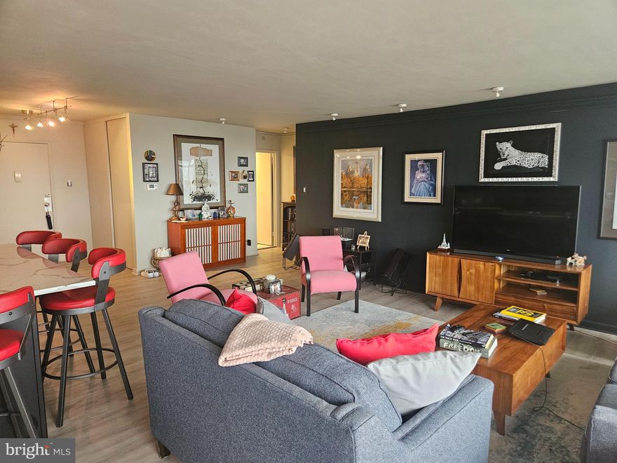 A fabulous, light filled one bedroom unit in the Philadelphian, now for rent! Every detail has been met during the amazing renovation that just took place for that special someone who appreciates luxury. With desirable details throughout, including hardwood flooring, recessed lighting, in unit laundry room, amazing closet space and large windows for ample natural light, this condo is a must see. The large open floorplan starts with a large coat closet and laundry/pantry closet, then proceeds to the amazing kitchen featuring brand new black cabinets, beautiful granite counters along with a fantastic breakfast bar and stainless steel appliances. Just beyond the kitchen you will find stunning built in cabinetry- perfect for displaying keepsakes and mementos. Proceed down the hall to the sundrenched bedroom with a brand new open closet perfect for someone with tons of clothes and shoes. The delightful bathroom was also totally renovated with new tile, vanity, medicine cabinet and built in shelving for extra storage. This unit boasts city views that will be sure to impress. Located directly across the street from the Art Museum, the Philadelphian offers fantastic amenities such as a 24 hour concierge service, a shuttle service 6 days a week, garage parking for a fee, in building grocery store, dry cleaners, bank, pharmacy, hair salon, Little Pete's Diner, not to mention the fitness center, indoor and outdoor pool. All of this, and ALL UTILITIES PLUS BASIC CABLE ARE INCLUDED IN THE RENT? What are you waiting for? See this unit today!  2 Year Lease Required.