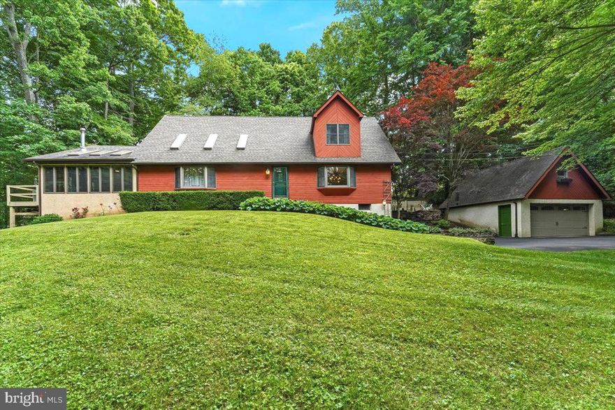 Welcome to this meticulously crafted 4-bedroom, 2.5-bath property with a 2 car detached garage that was built with extraordinary attention to detail as the builder’s personal residence. The stunning house offers beautifully designed indoor and outdoor living areas and is perfectly situated on over an acre in the Unionville Chadds Ford School District. You will be aww struck upon entering the front door, a magnificent front gathering room with strikingly high ceilings, 3 skylights and wood beams compliment the impressive space.  Continue through the gathering room and you will enter the sunroom that is a nature lover's paradise. Large windows and skylights allow you to enjoy natural light and the private wooded surroundings.  The wood burning stove keeps you nice and toasty warm in the winter months.  Flanking the entrance foyer are double doors leading into the spacious dining room with hardwood flooring, a bay window overlooking the picturesque front yard and opening to the Gourmet Kitchen which is a chef's dream.  Complete with a center island, plenty of cabinets with granite counters, stainless steel appliances, a decorative tile backsplash and a Bar area with a sink, wine fridge and sliders to the oversized deck that is perfect for Summer entertaining!  The luxurious primary suite is located on the upper level and offers hardwood flooring, a sitting area, Large walk-in closet with organizers and a gorgeous full bath complete with a decorative tile shower, Double vanity sink with granite counters, a built-in linen cabinet and pocket doors.   The other three bedrooms are on the main level of the house.  One off of the sunroom and two that share a private hall with an updated full bath complete with tile flooring, a new vanity with upgraded counters and a vessel sink. The lower level has a spacious finished area with built in shelving, recess lighting, gym area or a home office and a workshop or large storage area!  The 20x22 detached garage is perfect for a car enthusiast, hobbyist or anyone who needs a little bit extra storage space for their business.  There is also a room above that can be an office or additional storage room.  Every little thing about this property has been meticulously thought through from the stone entrance steps, the garden planters off the deck, built-in storage areas for large ladders, even the extra wide area in the driveway for parking or a game of basketball!  Come and see for yourself,  You will be AMAZED! All this PLUS the convenient location off of Route 202 & Route 1 where Wegmans, Wholefoods, all of the restaurants and shopping centers are only 5 mins away!