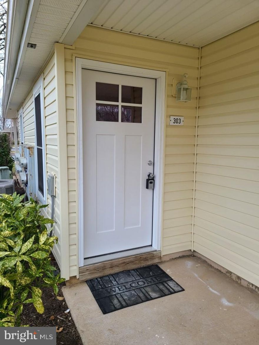 Welcome to 303 Shepherds Way. This second floor condo, located in the much sought after Tamerlane section of Village Shires, features two bedrooms and a Jack and Jill style bath.  The family room features a wood burning fireplace. From the family room there there are sliding glass doors leading to a  balcony with a trex deck. Full kitchen and laundry room with its own washer and dryer complete this Condo.