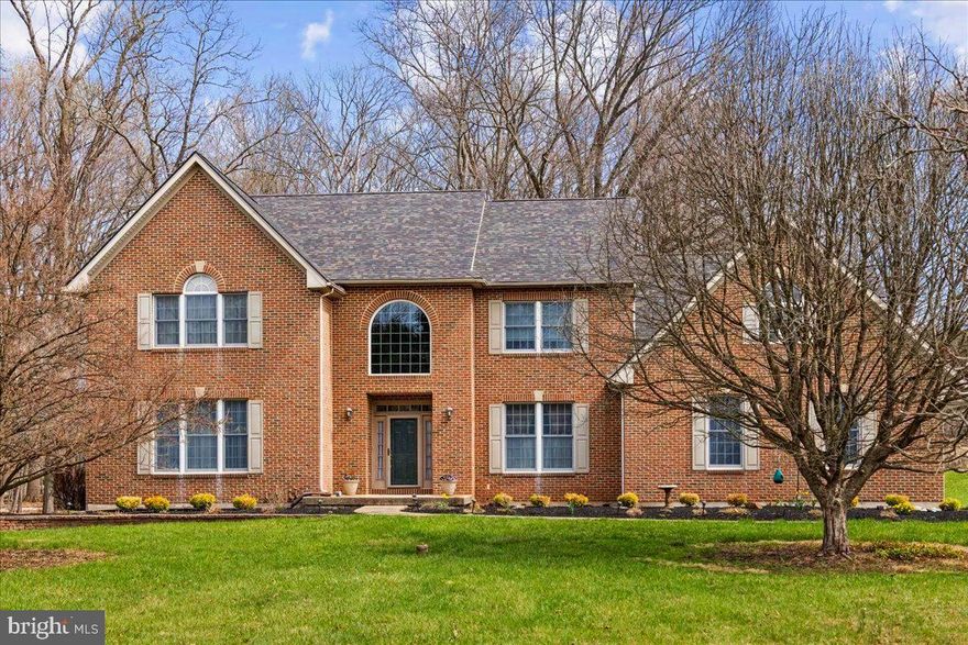 Debuting on the market for the very first time on a secluded 4-acre property, is a meticulously custom-designed brick colonial situated on the highly sought-after Middleton Lane. This generously proportioned 5 bedroom, 3.5 bath dwelling spans over an impressive 4,618 square feet of premium living space that has been impeccably preserved.  Inside, you'll find the interiors to be a blank canvas of flexible space, presenting a harmonious blend of an open concept kitchen and family room, further enhanced by the elegance of hardwood flooring throughout. The kitchen, tastefully updated not too long ago, boasts stainless steel appliances, fine cherry hardwood cabinetry, and a wine refrigerator stylishly embedded in the center island. In the warmer seasons, imagine stepping out onto your personal deck, conveniently accessible from the kitchen, and indulging in the calm and beauty of tranquil mornings in a picturesque landscape. The family room exudes comfort and warmth with the delightful touch of a brick wood-burning fireplace, perfect for unwinding. The first floor also includes an extra living room ideal for entertaining, a formal dining room, laundry room, and direct access to the 3 car garage. Exceptionally energy-efficient, this home has been outfitted with spray foam insulation and utilizes geothermal heating. Not to be overlooked, this property also features an in-law suite complete with its own exclusive stairwell, comprising a bedroom, full bathroom, ample closet space, and a multi-use living or office area. The upper level is rounded off with two guest bedrooms and a spacious en-suite primary bedroom complete with a walk-in closet, all bathed in abundant natural light. The expansive basement, currently used for incredible storage, eagerly awaits your personal finishes, and if more space is needed, the fully floored attic makes storage a breeze. This graceful residence, with its classic brick facade, new roof and alluring landscaping, sets an idyllic stage for creating priceless memories for years to come. Located conveniently close to unique shopping, entertainment, parks, restaurants, and situated within the highly regarded New Hope Solebury school district, this property promises an unparalleled living experience. Middleton Lane, renowned for its spacious lots and serene surroundings, offers a peaceful and high-quality lifestyle to its cherished residents. This is a seldom-seen opportunity, as turnover is infrequent, ensuring a sense of comfort with a home that promises a wonderful future.