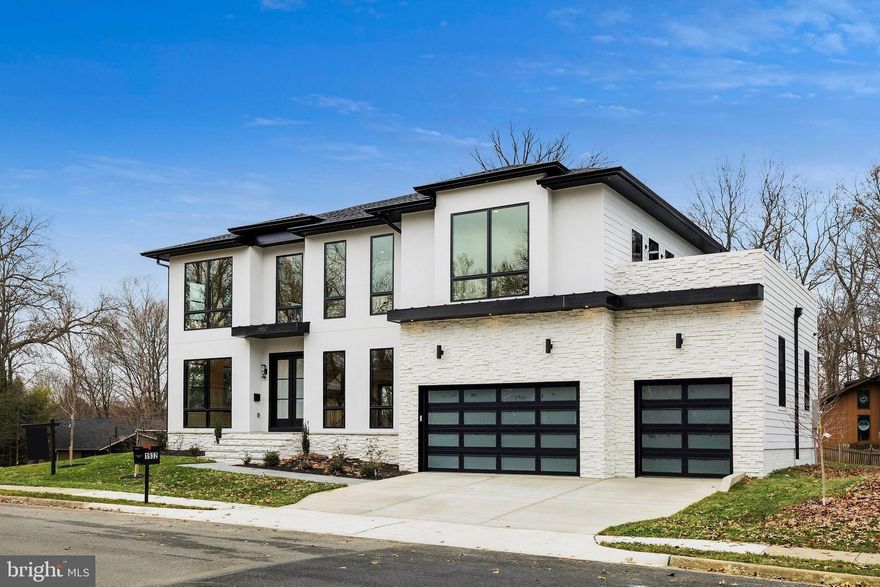 This beautifully designed modern prairie-style home spans 7,729 square feet of exceptional living space on a 0.34-acre lot in McLean. The open-concept floor plan, highlighted by a two-story entry foyer, gourmet kitchen with Thermador appliances, and a finished walk-up basement with a media room, wet bar, and exercise room, offers the perfect blend of luxury and modern functionality. Professional landscaping and thoughtful design ensure a seamless integration of indoor and outdoor spaces.
Zoned for Kent Gardens Elementary, Longfellow Middle, McLean High