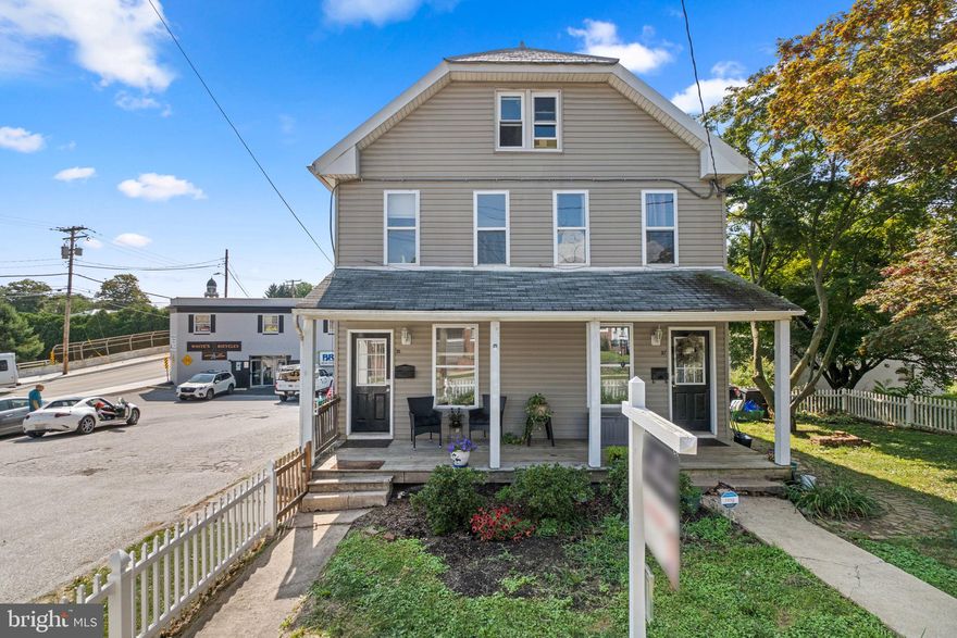 Historic duplex featuring 2,100 total square feet and two units separately metered, each offering 1,050 square feet, 3 bedrooms, and 1 full bath, now available together for residential or commercial use. Located in the heart of Old Westminster, this property presents an excellent opportunity for rental income or mixed-use potential in the Westminster Election District. This property boasts charming curb appeal, featuring a fully fenced, landscaped front yard filled with lush shrubbery and pathways leading to each entrance. A shared front porch spans the entire front of the property, inviting relaxation. Each unit features a mirrored floor plan, starting on the main level. Upon entering, you're welcomed into a light-filled living room that flows seamlessly into a spacious dining room, which is connected to an eat-in kitchen. Both kitchens were updated in 2005 and feature ample wood cabinetry with convenient rear access. Unit 37 also includes some stainless steel appliances for a modern touch. The upper levels of each unit offer three spacious bedrooms with plenty of storage, including a primary bedroom, a full bathroom, a laundry closet with a stacked washer and dryer, and a storage or bonus room. The unfinished lower level offers a blank canvas for customization. A paver stone pathway guides you to the side yard, offering open green space with trees providing added shade, and continues around to the rear yard, where a gravel area offers additional parking accessible from each unit's kitchen. This property is ideally located in downtown Westminster, adjacent to a large concrete lot with ample parking and surrounded by commercial properties. It’s also close to historic landmarks, community parks, and the eclectic shops, parades, holiday events, and dining options of Main Street.