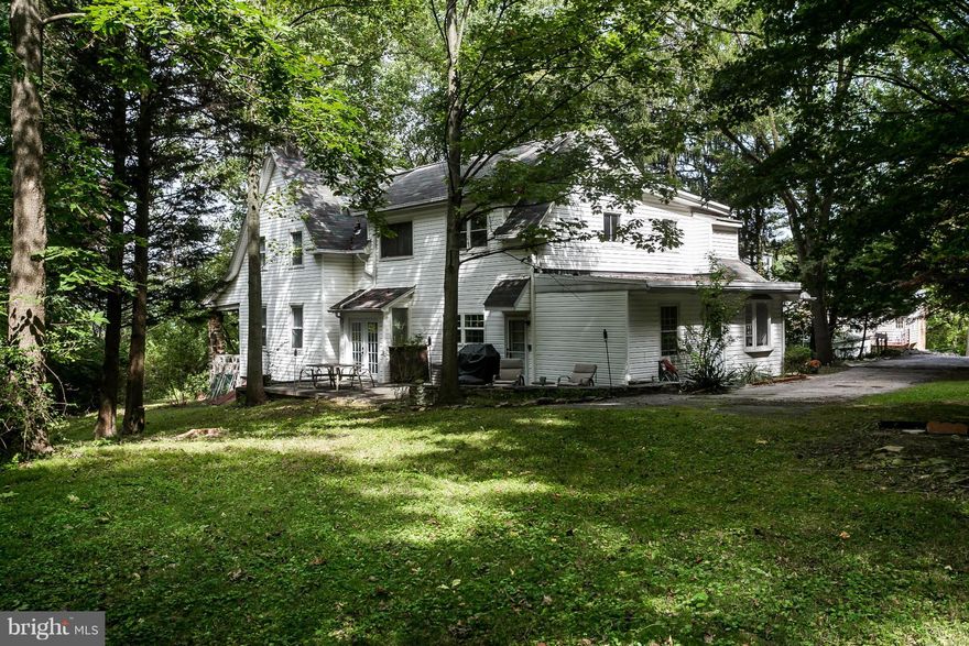 Beautifully updated 5BR, 4FB Colonial on .72 acres in Roland Park School District. New kitchen w/ granite and stainless opens to family rm. Flexible floor plan includes 2nd lvl master suite plus 5th bedrm and bath on main. High ceilings, columns, crown moldings, wainscoting & hardwd flrs throughout. This very spacious (3428 sq ft) home offers a private setting and porch front views to the valley.