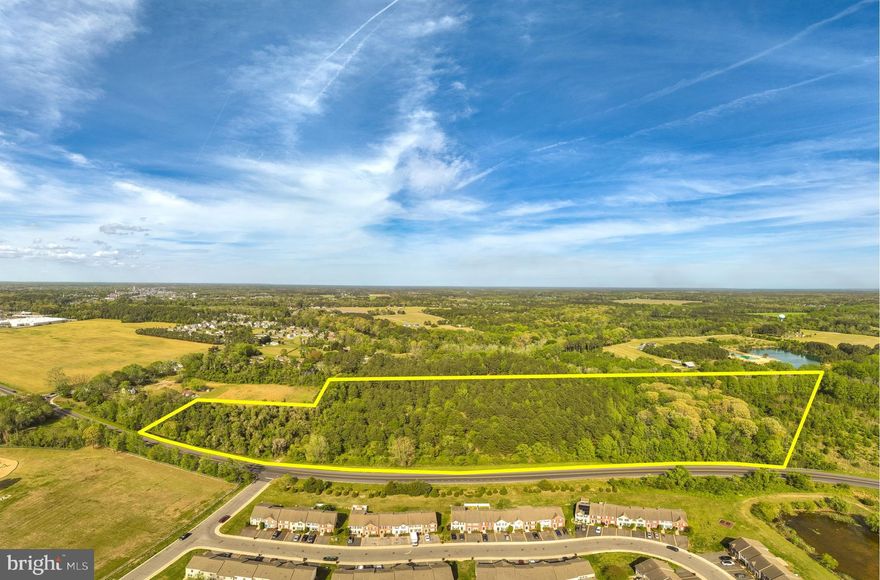 Development land located Right off of the Route 13 bypass on St Lukes Rd going in to Fruitland. This 9.14 Acres Wooded lot has +/-1,186 Feet off frontage on E Cedar Lane. This property is split zoned R1-A (Residential Single Family) & C-3 (Commercial).