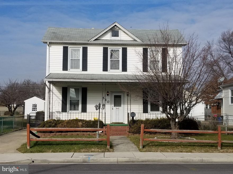 Handy Man Special. Drive Thru Garage with room for 4 cars plus a large driveway and a large lot.  This large home offers an updated kitchen and four large bedrooms. Covered front porch to relax on and traditional characteristics inside the home and hardwood under carpet(most rooms).  Move in now or renovate. AS-IS . Motivated Seller! Title work has been complete with North American Title.