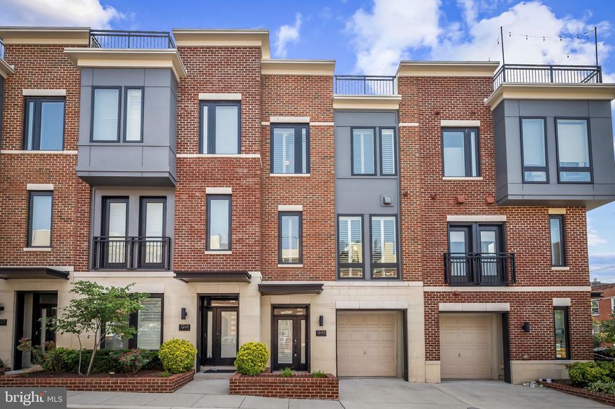 Gorgeous, modern townhome with 3 bedroom, 3.5 bathroom, attached garage, and amazing rooftop deck. The first level has a large bedroom with an en-suite bathroom. Upstairs on the main level you'll be greeted with tall ceilings and large open floor plan allowing for tons of natural light. The gourmet kitchen features sparkling white cabinets, stainless steel appliances, and huge kitchen island. The kitchen opens up to the large living room, dining room, and main level powder room. Upstairs you'll find two more large bedrooms each with an en-suite bathroom and a sizable walk-in closet. Also upstairs is the conveniently located washer and dryer. Walk upstairs to the rooftop deck which features great city views and a wet bar - your outdoor oasis! Pets considered on a case by case basis. Available immediately.