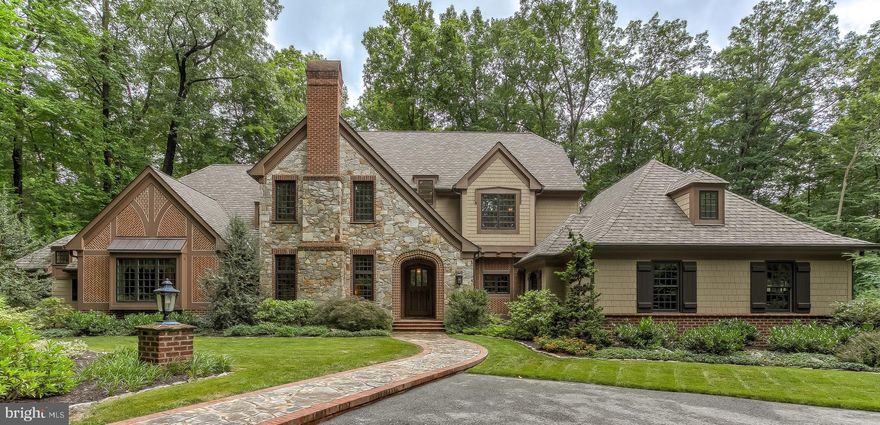 An enduring lifestyle choice in coveted locale. Tree-lined welcome that reveals outstanding country estate resting on 10+/- ac of natural splendor and miles of trails. Stunning Walter Daniels design elevates your daily existence. Salivate over signature Benhoff millwork, craftsmanship & finishes. Every design detail was carefully selected and quality crafted to create warm & inviting family spaces with an elegant yet casual feel. Inspiring Butler stone and Cushwa brick with Herringbone accents highlight the stately exterior. Brick archway with over-sized wood entry door lead guests into a foyer and expansive Great Room with soaring two-story ceilings with exposed beam framing which carries over to the awe inspiring Chef s kitchen. John Canatellie design-build provides five cooking areas with three sinks, SubZero side by side refrigerator, Wolfe gas range & stove, additional KitchenAid oven, two Miele dishwashers, granite counters & Italian tile backsplash and inlaid cabinets. Revel in the tranquility of the Four Season room offering well curated use of bluestone, shiplap siding, tongue & groove ceiling, Butler Stone fireplace and custom BBQ with built-in Wolfe grille, hooded exhaust and granite prep area. Endless lifestyle options include sophisticated main-level master suite, a spa-like master bath with Kohler soaking tub & walk-in tile shower with Body Jets, dreamy master closet with center isle vanity, private elevator, expansive main level laundry, three stately en-suite bedrooms, wine cellar with tasting area, 2-car heated main garage and additional 2-car collectors garage. Functional, elegant and exquisitely crafted with stunning custom finishes - this 5,911 sf masterpiece (2013) exhibits an impeccable flow and seamless blending of indoor and outdoor spaces. Nestled in the serenity of My Lady's Manor & Hereford Zone schools and only minutes to Wegmans, Manor Tavern & I -83.