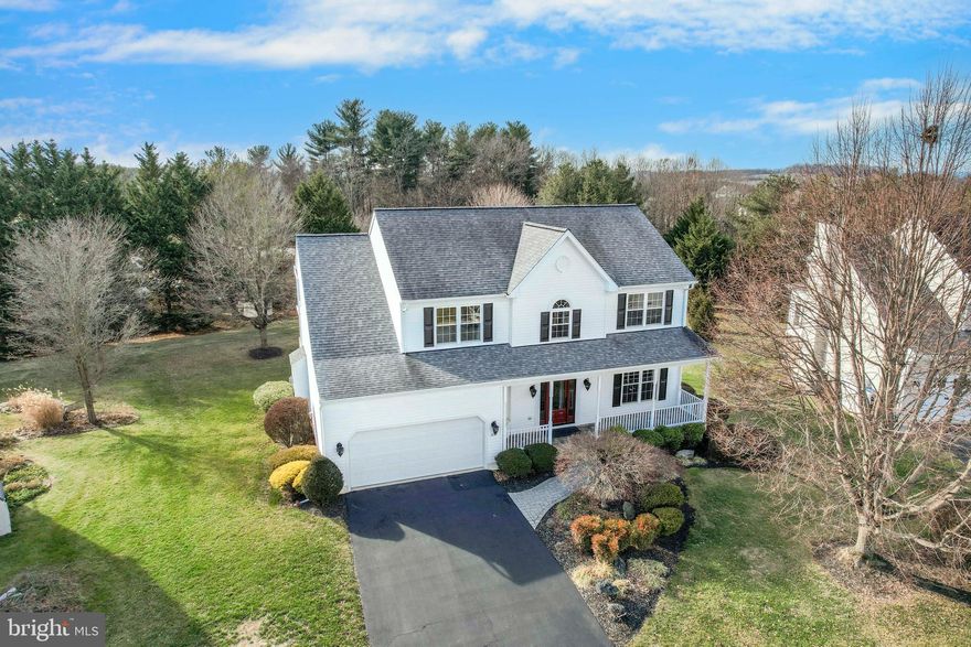 OPEN HOUSE this SATURDAY 11am to 1pm*Welcome to this beautiful 4BR, 2.5BA Colonial in rarely available “Meadow Ridge,” ideally situated near the end of a quiet cul-de-sac*This exceptional home offers the perfect blend of privacy, thoughtful upgrades, & everyday functionality—plus public water & sewer with no city taxes*The exterior impresses from the start with a large custom front porch featuring stone paver flooring*Beautifully landscaped & backing to trees, the flat backyard provides both privacy & usable space*Enjoy outdoor living on the spacious rear deck & screened-in porch overlooking nature*Inside, the main level showcases solid wood flooring & a welcoming two-story foyer with a stunning new custom front door & updated light fixtures throughout*The light-filled living room & dining rooms flow seamlessly into the updated kitchen, complete with granite countertops, center island, custom backsplash, 42-inch cabinetry, & stainless appliances*The kitchen opens to a bright breakfast room & a spacious family room featuring a cozy gas fireplace plus custom built-in decorative shelving*A convenient main-level laundry & updated half bath complete this level*Major mechanical updates provide peace of mind, including a brand new Daikin HVAC heating & cooling system, a newer hot water heater, newer roof, & efficient natural gas heat*Upstairs, most of the upper level continues the solid hardwood flooring*The primary suite is a true retreat with cathedral ceilings, a walk-in closet with high-end cherry shelving closet organizers, & a remodeled primary bath with double sinks, heated ceramic tile floors, soaking tub, & large tiled walk-in shower*Three additional bedrooms & another full bath round out this level*The lower level boasts a sitting room, game room, & rec room all with new carpet & paint, plus a spacious utility room & additional storage room*Rough-in full bath ready for your finishing touches*This home truly has it all—privacy, updates, space, & location*Don’t miss your opportunity to enjoy peaceful cul-de-sac living in one of Westminster’s most desirable neighborhoods*