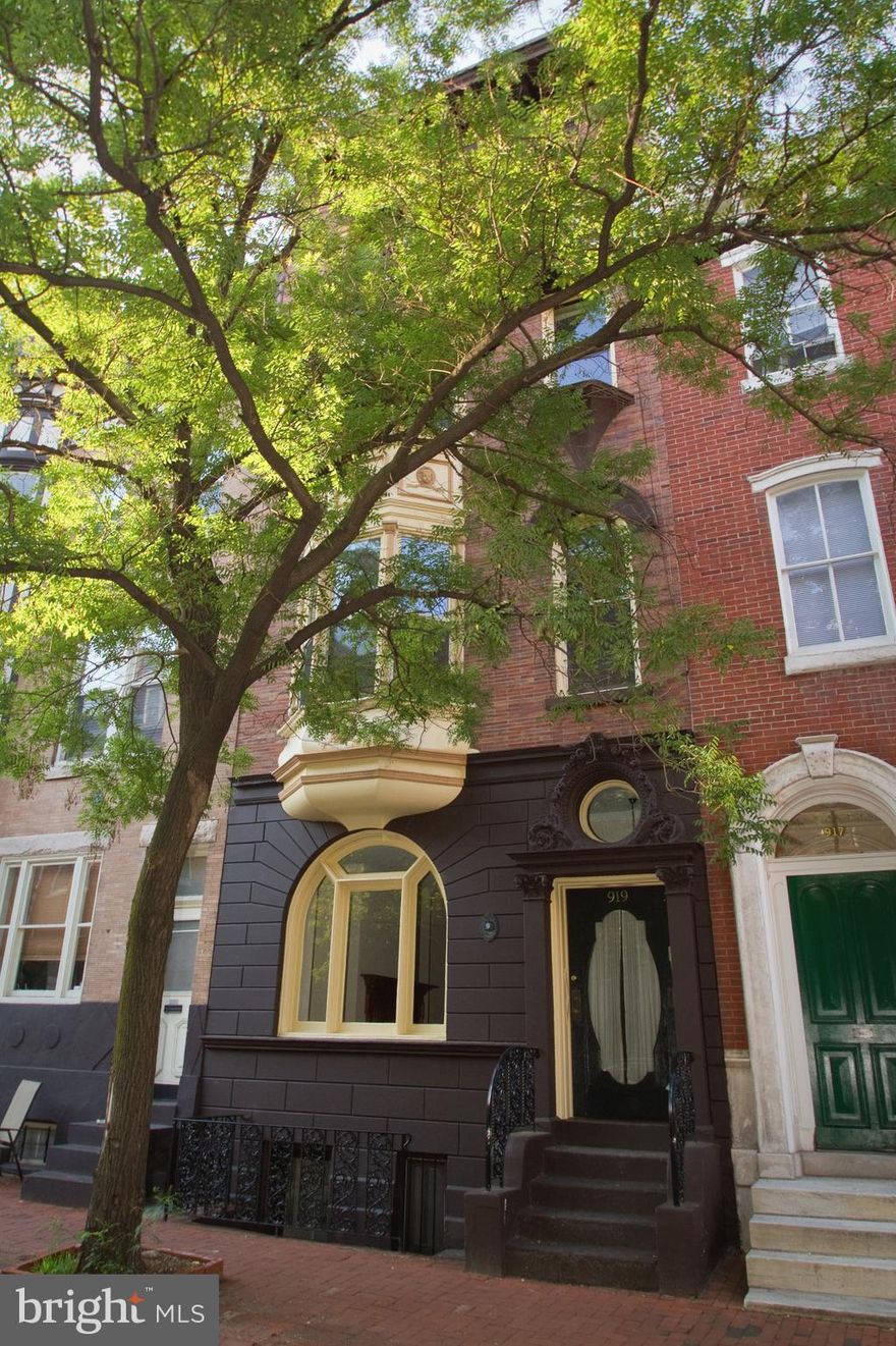 Unique four-story historic style home that is ready to be updated to your taste! Located on the finest block in Washington Square West! This large home offers many classic original features, 5 bedrooms, 4.5 baths, great storage/closet space, den, built in shelving, multiple non-working fireplaces, large main bedroom suite, covered portico balcony, high ceilings, beautiful wood floors, french doors to yard, upper floor laundry room, multiple skylights and finished lower level, perfect for au pair/in-law suite. Just a short walk to Jefferson, Penn, South Street, Center City business district, Broad Street and more!