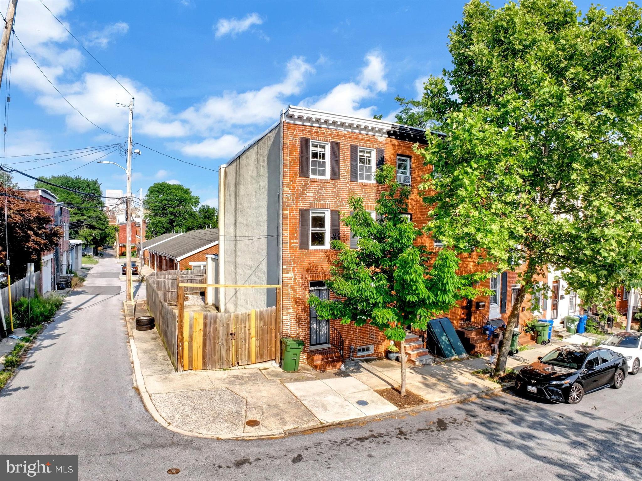 Welcome to 115 Parkin St! This beautifully updated 2-bedroom, 3-full bathroom row home features modern finishes and spacious living areas and flow. Situated on a double lot (113 Parkin St is included in this sale), which offers ample buildable space or the option to use as a generous parking pad, it provides versatile outdoor potential. Relax in the finished basement for extra living space that features a fireplace and full bathroom. Located just minutes from major highways, downtown Baltimore, and the University of Maryland, this home combines convenience with comfort in a desirable neighborhood. Schedule your showing TODAY!