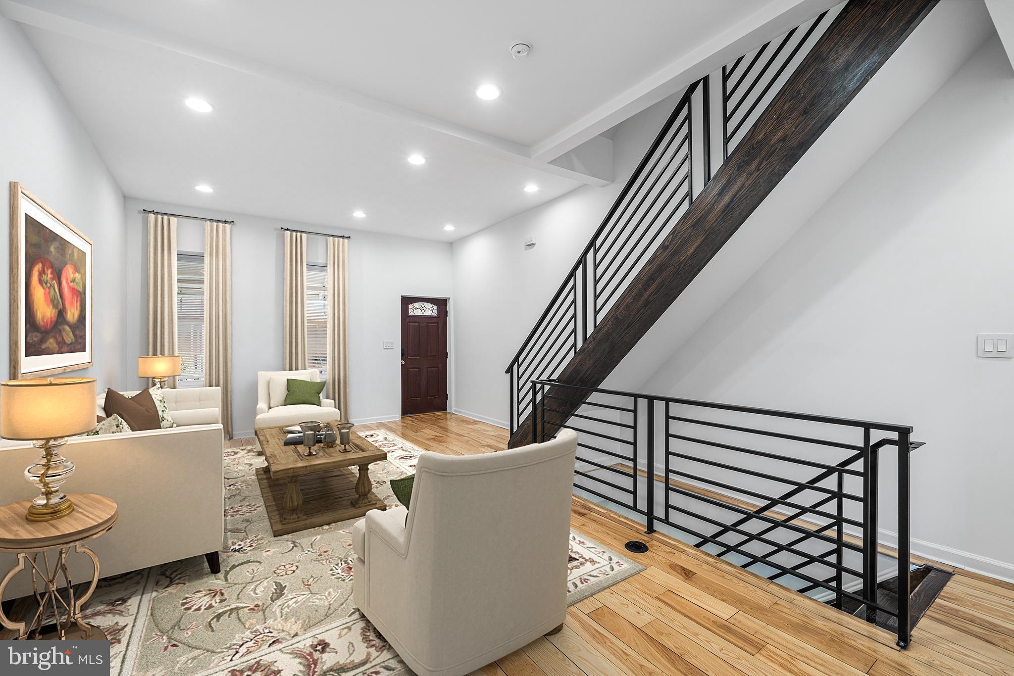 Welcome to this large, renovated 4 bed, 3.5 bath house in Powelton Village. On the outside, you’ll notice the charming brick facade and a classic West Philly front porch. The first floor boasts tall ceilings and a large, open floor plan with room for a living space, dining area, barstool seating, and a sizable kitchen. The contemporary kitchen features stainless steel appliances including a dishwasher and built-in microwave, tiled backsplash, and granite countertops. A convenient half bath is located on the first floor. Off of the kitchen is access to the fenced backyard - big enough to throw a BBQ or plant a garden! On the second floor, you’ll find a bedroom with ensuite bathroom on the back of the house. This floor has coveted second-floor laundry and another full bathroom with a linen closet! The front of the home has a sunny bedroom with big closet. On the third floor back of the home sits the primary suite. It features a walk-in closet, ensuite bathroom with double vanity, standalone bathtub and walk-in shower, and two sides of windows in the bedroom. This floor also has the 4th bedroom - perfect for a nursery or home office. The roof deck spans the depth of the home and has wonderful city views. The basement is fully finished, with ample room for storage, a home gym, play room - anything you can dream of! West Powelton is located near Drexel and U Penn, CHOP and Penn Presby - with quick access to Rittenhouse and Center City. Lee’s Market and Asad’s Hot Chicken will be your go-to take-out spots, and a quick walk over the Spring Garden bridge will lead you to all of Philly’s best museums.
