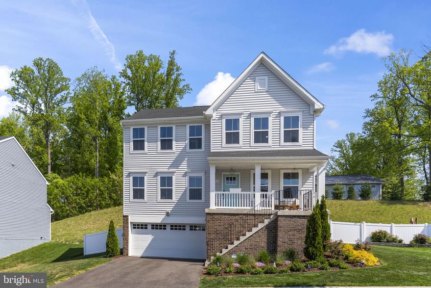 Welcome to 2944 Heritage Dr., Chesapeake Beach, MD 20732.  This Colonial features a finished basement, fenced yard, and brand-new composite deck. It sits on a quiet cul-de-sac in sought-after Heritage Woods, where newer construction, thoughtful upgrades, and coastal lifestyle convenience come together in one exceptional home. This residence offers an open floor plan, upgraded kitchen, and turnkey living, just minutes from the Chesapeake Bay and within commuting distance to DC, Annapolis, and Joint Base Andrews. 

Built in 2022, this meticulously maintained 4-bedroom, 3.5-bath home shows like a model and offers modern design, functional living space, and high-end finishes throughout -- perfect for buyers seeking a move-in ready home with an open floor plan, finished basement, and upgraded outdoor living.

From the moment you enter, you’re welcomed by a bright, open-concept layout designed for everyday living and entertaining. The main level features a spacious foyer, private home office with double doors, and a flexible formal dining or sitting room. A convenient half bath on the main level adds everyday functionality. The heart of the home is the upgraded chef’s kitchen, complete with quartz countertops, an oversized center island with seating, upgraded cabinetry, designer backsplash, stainless steel appliances, enhanced lighting, and a pantry for added storage. The kitchen flows seamlessly into the family room and sun-filled morning room, creating a light-filled central gathering space.

Upstairs, you’ll find four generously sized bedrooms, including a well-appointed primary suite designed as a private retreat. The suite features a large walk-in closet and a spa-style bath with dual vanities, soaking tub and separate shower. A convenient upper-level laundry room adds to the home’s everyday functionality.  

The fully finished basement significantly expands the home’s usable square footage, offering a large recreation room, full bathroom, and a versatile bonus room currently used as a guest space -- ideal for a home gym, office, playroom, or potential fifth bedroom.  

Outdoor living is a standout feature. The brand-new composite deck and newly fenced back yard create a low-maintenance outdoor space perfect for entertaining, relaxing, or enjoying pets and family. This combination of a fenced yard, deck, and newer construction is highly sought after and rarely available at this price point.  

Additional highlights include: an oversized garage with exceptional storage capacity and a custom-built-in mudroom area that enhances organization and everyday convenience.

Ideally located, the home is approximately 3 miles to the Chesapeake Beach and North Beach boardwalks, marinas, and waterfront dining, and about 6 miles to the Sunderland Park & Ride commuter lot. Additional commuter distances include approximately 20 miles to Annapolis; 28 miles to Joint Base Andrews; 32 miles to the I-495 Capital Beltway; 35 miles to Washington, DC; and 34 miles to Coast Guard Headquarters and DHS Headquarters.  

This Heritage Woods home is part of a sidewalk-lined, streetlight community designed for modern living.  If you’re searching for a move-in ready home with modern finishes, flexible living space, and already-completed outdoor upgrades, this property is a must-see.