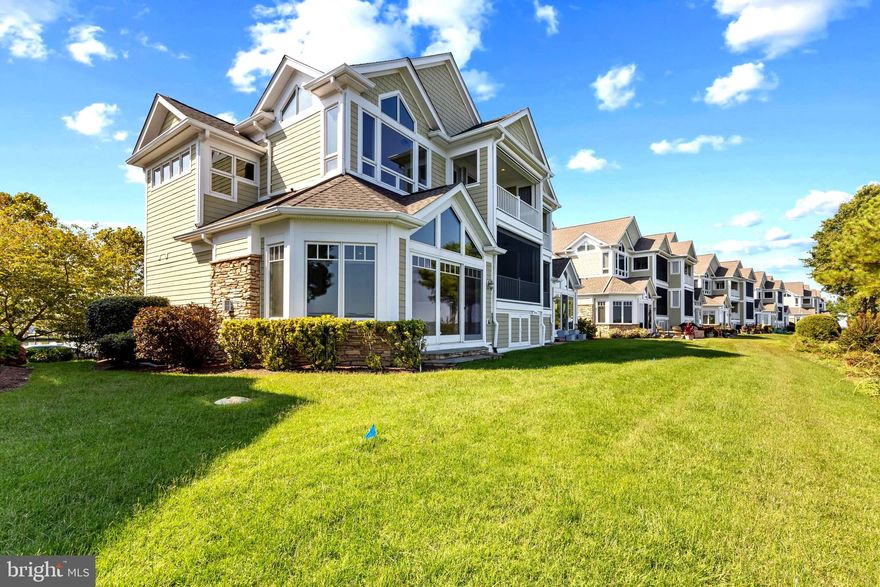 Experience Exceptional Waterfront Living on the Chester River!  A stunning 3000 sq ft townhome featuring 3 bedrooms, 3.5 bathrooms, a dedicated office and a large bonus room - offering the perfect combination of comfort and flexibility.  This was also one of the few "stretch" units- built wider to accommodate setbacks.   Inside you'll find an open floor plan that's perfect for entertaining!  It has  hardwood floors,  a dramatic floor to ceiling stone fireplace,  a gourmet kitchen with high end appliances & finishes, granite countertops, and ensuite bathrooms in all the bedrooms!  Enjoy Beautiful Water Views from nearly every room thanks to thoughtfully designed architectural windows.  Two covered decks with remote controlled screens invite you to relax and take in the breathtaking views over the Chester River. You also have a 2 car attached garage!  Located in an exclusive gated community on a private peninsula, this home backs up to the renowned Safe Harbor Marina that offers a pool, fitness center, and over 600 slips, making it a boaters dream!  Narrows Pointe is just around the corner from many great ( docking) restaurants, tiki bars, coffee and dessert spots!  Golf enthusiasts will love being just 5 minutes from Queenstown Golf Links, close to other courses too!  Outlet shopping is nearby for convenience.  Only 20 minutes from Annapolis and Easton, 45 minutes from BWI Airport, 55 minutes from Washington, DC & Baltimore, and 1 1/2 hours away from Ocean City !  Whether you're looking for a year-round residence or a weekend retreat, this home offers the ultimate Chesapeake Bay lifestyle !