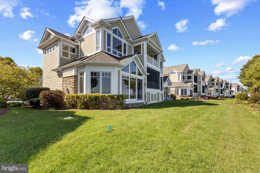 Experience Exceptional Waterfront Living on the Chester River!  A stunning 3000 sq ft townhome featuring 3 bedrooms, 3.5 bathrooms, a dedicated office and a large bonus room - offering the perfect combination of comfort and flexibility.  This was also one of the few "stretch" units- built wider to accommodate setbacks.   Inside you'll find an open floor plan that's perfect for entertaining!  It has  hardwood floors,  a dramatic floor to ceiling stone fireplace,  a gourmet kitchen with high end appliances & finishes, granite countertops, and ensuite bathrooms in all the bedrooms!  Enjoy Beautiful Water Views from nearly every room thanks to thoughtfully designed architectural windows.  Two covered decks with remote controlled screens invite you to relax and take in the breathtaking views over the Chester River. You also have a 2 car attached garage!  Located in an exclusive gated community on a private peninsula, this home backs up to the renowned Safe Harbor Marina that offers a pool, fitness center, and over 600 slips, making it a boaters dream!  Narrows Pointe is just around the corner from many great ( docking) restaurants, tiki bars, coffee and dessert spots!  Golf enthusiasts will love being just 5 minutes from Queenstown Golf Links, close to other courses too!  Outlet shopping is nearby for convenience.  Only 20 minutes from Annapolis and Easton, 45 minutes from BWI Airport, 55 minutes from Washington, DC & Baltimore, and 1 1/2 hours away from Ocean City !  Whether you're looking for a year-round residence or a weekend retreat, this home offers the ultimate Chesapeake Bay lifestyle !