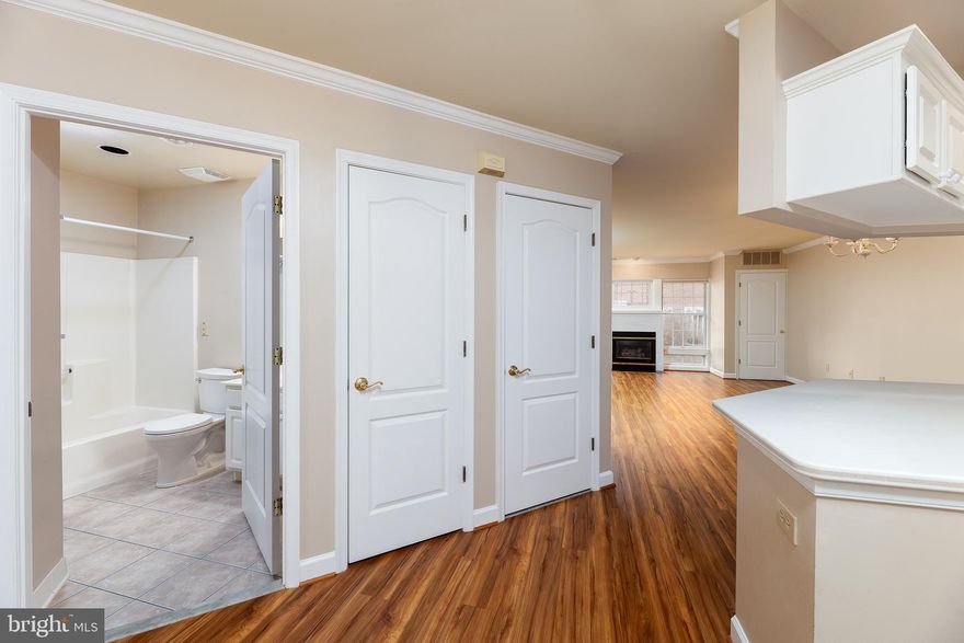 LOCATION!  *** STAIR-FREE ENTRY ***  10 minute walk to metro on W&OD Trail.  Situated in the highly sought-after Falls Station complex, this two bedroom, two bath condo is conveniently located in the lower level with stair-free entry.  ** This unit features a bright & spacious main living area, newer appliances, wood floors and specialty blinds. Brand new plush carpet in bedrooms and gorgeous wood flooring throughout main living area!  ** The charming living room features a gas fireplace surrounded by windows, with a stained glass window above.  Sliding glass door leads to an outdoor patio and expansive green space.   **  1 assigned parking space included in rent, with a second available for rent.  ** Wonderfully located steps from the W&OD Trail, 10 min walk to EFC Metro, 1 block from I-66, and a short drive to the newly bustling Little Falls City complete with New Harris Teeter, shops and eateries. ** Pets considered on a case by case basis. AVAILABLE IMMEDIATELY!