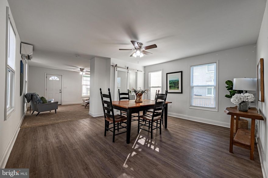 This well-cared-for single-family home offers a practical floor plan filled with natural light throughout. The property has been thoughtfully updated with a brand-new kitchen, two beautifully renovated bathrooms featuring new tile and modern showers, new flooring and carpet, fresh interior paint, and updated lighting fixtures throughout the home. Additional upgrades include all-new windows and an energy-efficient mini-split HVAC system with air conditioning for year-round comfort.  The interior layout provides a generously sized dining area and the convenience of a dedicated laundry room on the second floor. The finished lower level adds valuable storage space along with a flexible work area.  Outside, you’ll find a fenced yard with an exceptionally large backyard for the neighborhood, as well as a three-car asphalt parking pad. Ideally situated close to shopping, dining, and major commuter routes, this home offers both comfort and convenience.