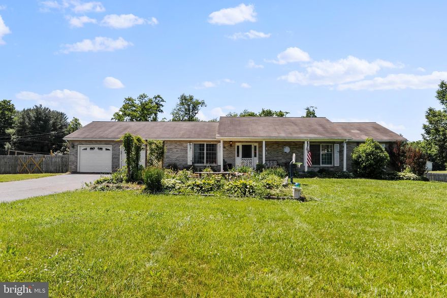 Back on the market due to NO fault of the sellers or the house. If you missed it the first time don't fret, you can schedule your showing today!  Situated on sprawling acreage, this cozy rancher has a welcoming front porch where you can sit and enjoy a peaceful afternoon. Featuring inspiring spaces and an exceptional amount of outdoor land, you are sure to enjoy your time at this home.  Inside you will find an open concept living area great for entertaining guests.  Built in cabinetry offers plentiful storage and a convenient coffee nook.  Large windows allow natural sunlight to drench the rooms, showing off the easy to care for flooring. The main level features four bedrooms and two full bathrooms.  The lower level extends your living space, providing a flex room that would be a great home office.  The spacious living area and additional full bathroom on the lower level afford plenty of room for your guests.  Bring the BBQ and dine al fresco this summer.  Close to commuter routes, walking trails and restaurants. Schedule your showing today!