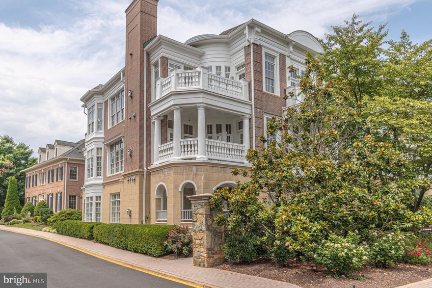 Ready for a truly luxurious PENTHOUSE condo and spectacular GATED community in downtown McLean? This stunning 3,557 sq ft, sun-filled, 2-level home with 3 bedroom, 3.5 bath is sure to dazzle you! This home is defined by a feeling of openness throughout. Its soaring ceilings, generously proportioned rooms, tall windows, extensive architectural details, distinctive moldings, hardwood flooring throughout, and sophisticated paint colors are a few of the many special features. Walking up to the building is like entering a classic mansion. Refined décor, elaborate woodwork, open stairways and marble floors provide a welcoming entry for all to enjoy. There are a total of seven units, with only two penthouse units. Entering the home, you are greeted by a large, elegant foyer with 10’+ ceilings, arched doorways, angled walls and elaborate woodwork. The hallway also features a coat closet with organizer, and a convenient powder room. As you step into the expansive, light filled, living room you are greeted by a panoramic, open floor plan with multiple conversation areas. This area features floor to ceiling windows, refined wainscoting paneling, tray ceiling with cove lighting and marble surround gas fireplace. There is also a pass through to the offset, separate wet bar room, another pass through to the kitchen, as well as French doors opening to the long corner terrace. Adjoining the living room is a banquet sized formal dining room offering wainscoting paneling, tray ceiling with cove lighting, a gorgeous wall of windows and ample wall space for displaying artwork. Your dinner guests will not want to leave! The gourmet kitchen has everything!!! Viking Professional stove, Subzero refrigerator, KitchenAid Microwave, two dishwashers, an abundance of granite counters and tall wood cabinetry with many special features, under-cabinet lighting, center island with counter eating space, built-in desk area, a pantry and of course a private balcony for your morning coffee! Across the foyer from the kitchen entrance is a second, grand two-story circular landing area acting as a central focal point for the home. This area features a dramatic open staircase leading to the second floor and provides access to the main floor bedrooms, access to an open interior study with refined enameled cabinetry, complete with recessed lighting, glass shelves and mirrored back panels, and access to the wet bar that serves the living area. Let’s move on to the main floor primary bedroom suite. Highlights include a 22’ x 14’ bedroom with a 10’ x 9’ sitting area, two walk-in customized closets, private corner balcony and spa-like ensuite bath. The bath offers double vanity sinks with a make-up area, huge walk-in shower and water closet. Moving to the second bedroom with customized closet and ensuite bath. There is a laundry closet with GE steam washer/dryer and another hall closet in that area. The upper level offers a large family room with dormers, a separate bedroom, a private bath and a bonus room for an office, exercise space, etc. The floor plan and amenities offer comfortable everyday living and gracious entertaining at its finest! To access your two assigned garage spaces, take the elevator down and walk a few steps straight ahead as you enter the garage. Evans Farm is a signature example of a luxury community with 31% of the community open space! The developers integrated the pond, Millhouse and Stonehouse into the site plan with new plantings to encourage use of the landmarks as gathering places. There is an abundance of landscaped walkways for residents to enjoy the serenity of the community. There are 24-hour surveillance cameras and secured entry gates on both Dolly Madison Blvd and Chain Bridge Road. A highly desirable location in downtown McLean and minutes from Tysons Corner, providing a vast array of shops, restaurants, businesses and community activities. Prime access to GW Parkway, 495, 66 and a mile from the McLean Metro Station.