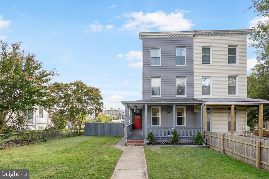 Welcome to this newly renovated end-of-group rowhome where no detail has been spared! Start your mornings with a cup of coffee on the covered front porch while watching the sunrise. Inside, you’ll be greeted by luxury vinyl plank (LVP) flooring that flows throughout the main level. The spacious and bright living room is a true showstopper with shiplap detail around the mantel, coffered ceilings, and recessed lighting. The chef’s kitchen boasts quartz countertops, stainless steel appliances, tile backsplash, abundant cabinetry, a large corner pantry, and bar seating for casual meals. The dining area provides the perfect setting to wine and dine guests. The second level features a primary suite retreat complete with a tray ceiling, electric fireplace, walk-in closet, and a spa-like ensuite bathroom showcasing dual sinks and a large walk-in tiled shower. A second bedroom with its own ensuite bath and custom tiled shower completes this floor. On the third level, you’ll find two spacious bedrooms that share a full hall bath with a tub/shower combo, perfect for relaxing after a long day. The fully finished lower level offers endless possibilities with a second living room or recreation room, plus an additional bedroom and full bathroom for guests or extended living space. Step outside to the fully fenced backyard, ideal for summer BBQs on the deck or quiet evenings outdoors. Conveniently located near Route 40, Frederick Avenue, and I-695, this home offers the perfect balance of modern style, thoughtful design, and everyday convenience. Don’t miss your chance to make this move-in ready home your own, schedule your showing today!