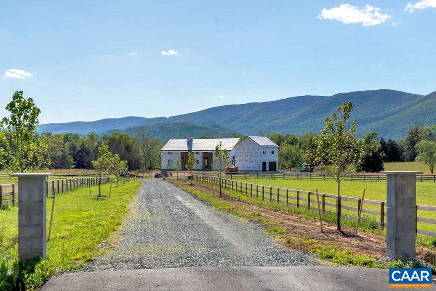 Gorgeous setting near the Blue Ridge. Some pictures are actuals and some are of homes that inspired the builders design. The covered patio and most rooms enjoy the views. There is still time to customize interior finishes! Outstanding quality of woodworking and fine details throughout. Master suites on both floors. All five bedrooms have full baths en suite. Over the 3-car garage is a guest suite with  cathedral ceiling sitting room. The 5.67 acres are open and flat for ease of play, gardening and having animals. Meriwether Lewis school district. Close enough to Charlottesville, UVA and Crozet for convenience, yet tucked away at the end of a private road. 4 public lakes/ parks are within 15 minutes- swim, boat, hike and relax!,Granite Counter,Wood Cabinets,Fireplace in Living Room