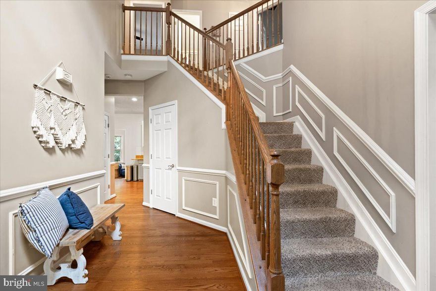 Don’t miss this incredible opportunity to tour a stunning colonial on 2 private, wooded acres in sought-after Huntingtown, priced to move with a motivated seller—bring your best offer! Let's make this home YOURS!  This spacious home features real hardwood floors, a two-foot builder bump-out, and a beautifully updated kitchen (2022) with granite countertops, stainless steel appliances, ample cabinet space, and a pantry. The cozy family room offers a wood-burning fireplace, while the fenced backyard boasts a two-tiered deck and hot tub, perfect for entertaining. Upstairs you’ll find four generous bedrooms including a primary suite with vaulted ceilings, a huge walk-in closet, and a spa-like bath with soaking tub, walk-in shower, and dual sinks. The finished basement includes a tiled sunroom ideal for a game room, theater, or bar. Recent upgrades include a new roof (2022), HVAC and water heater (2022), a water softener (2024), plus two HVAC units, a large garage, abundant storage, and a one-year home warranty. Conveniently located near D.C., Annapolis, Baltimore, and military bases, this home also offers access to excellent schools, parks, and a welcoming community.