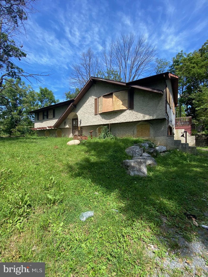 Take a look at this stunning four-bedroom, two-and-a-half-bathroom bi-level home situated on an expansive 1.45 acre of land. This beautiful property offers a harmonious blend of spaciousness, comfort, and natural serenity, making it the perfect oasis for those seeking tranquility and ample living space.  A sizable driveway provides abundant parking space for multiple vehicles, and the rear deck and backyard are perfect for summertime entertaining. Entering through the double front doors and starting upstairs, you are greeted by a welcoming living room, flowing into the dining area and kitchen. Down the hall are a bathroom and three spacious bedrooms, with the master having its own private bathroom. Moving downstairs is one more bedroom, as well as a family area and kitchenette perfect for entertaining guests or great mother/daughter set up. There is also a convenient half bathroom, laundry room and plenty of storage space. Being offered at $251,000, call to schedule your private showing today!