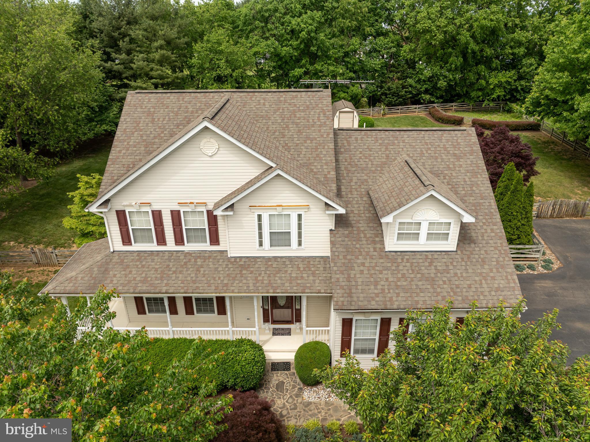 Welcome to 680 Mara Rose Lane , a beautifully upgraded and meticulously cared for home on 1 serene acre in Harpers Ferry. Thoughtfully designed for both comfort and entertaining, this residence pairs high-end finishes with inviting outdoor spaces, creating a one-of-a-kind living experience. The lower level is a potential in-law suite and includes a second kitchen with appliances, stand alone freezer, and walk-out exit. This home offers over 3400 finished square feet and includes four bedrooms and three an one half baths. The lower level offers another room which could be used as another sleeping area, and is currently being used as an exercise room.
Upgrades include gourmet kitchen with granite countertops, tile mural backsplash, and stainless appliances. Formal dining room with Brazilian cherry floors, custom wainscoting and crown molding. Spacious primary suite with oak hardwood flooring, walk-in closet, and luxe marble-tiled bath with dual vanities and whirlpool tub. Upgraded flooring includes travertine with mosaic inlays, engineered plank, and custom ceramic in finished basement . There are 2 fireplaces, new upgraded windows (2024), and is freshly painted. All furniture in the lower family area conveys, including the pool table, electric fireplace and LED TV- multiple pieces of gym equipment remain as well! Expertly landscaped property with mature plantings, stonework accents, fenced garden area, estate-style backyard fencing for privacy and safety, and solar-powered custom shed.- all contents convey including snow blower and gas powered lawn equipment. Newer HVAC, whole house fan, newer roof, and high-speed internet. Minutes to Harpers Ferry, Shenandoah River, and trails.