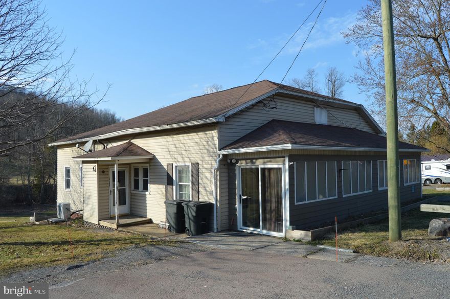 Endless Potential! This diamond in the rough is ready for your vision and creativity. A fantastic opportunity to make this home truly your own. Bring your tools and imagination---this home is waiting for a makeover. Great Investment property! It was used as a Duplex, home needs work but offers a great value for the right buyer. Newer furnace, newer windows installed throughout. Hardwood floors, covered front porch, beautiful backyard area. This property has .96 of an acre, several sheds for storage included. Around 2000 +/- sq. feet of living space.  Full basement with tons of storage, finish off for added sq. footage. Call today to set up a viewing of this property.