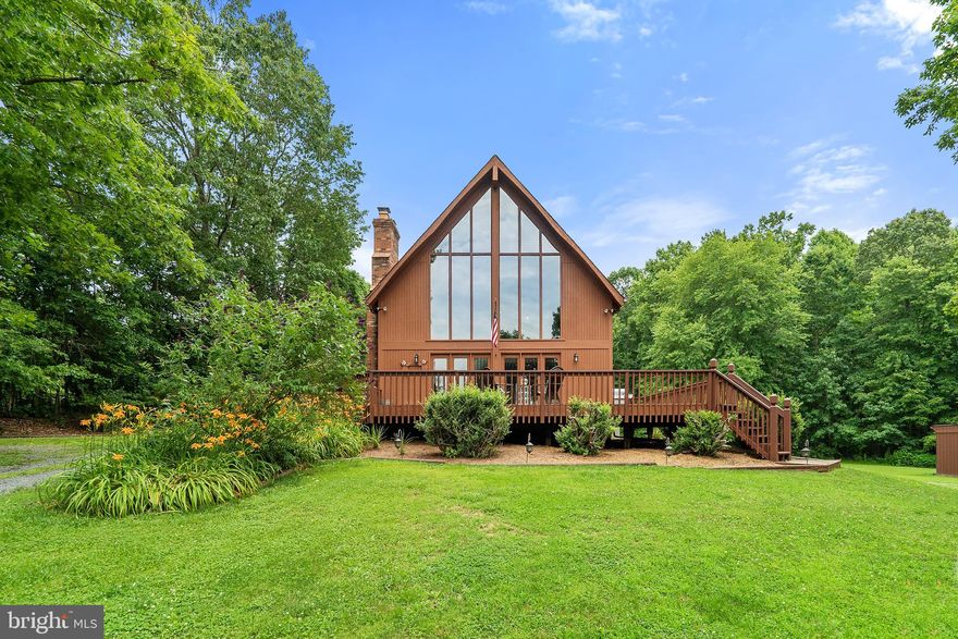 Beautiful A Frame home, recently renovated, all new lighting fixtures, granite counters, new stainless kitchen appliances, new hardware, white-washed fire places! The roof on the home is 5 to 7 years old, the roof on the building/garage is new as of this year! 2 acres and a pond. The detached building could be used as a large garage or shop! So many options. The back side of the building has two stalls if you have animals! The basement has a spacious rec room with a second kitchen & fireplace. There is also an additional room with walkout access to backyard. Laundry room is spacious with access to backyard, as well. Enjoy time on the decks! Yes decks! The decks are large and inviting with plenty of space for out door parties and barbecues! Comcast Internet! **The front doors will be replaced with new large sliding glass doors, have been ordered just waiting on arrival!**