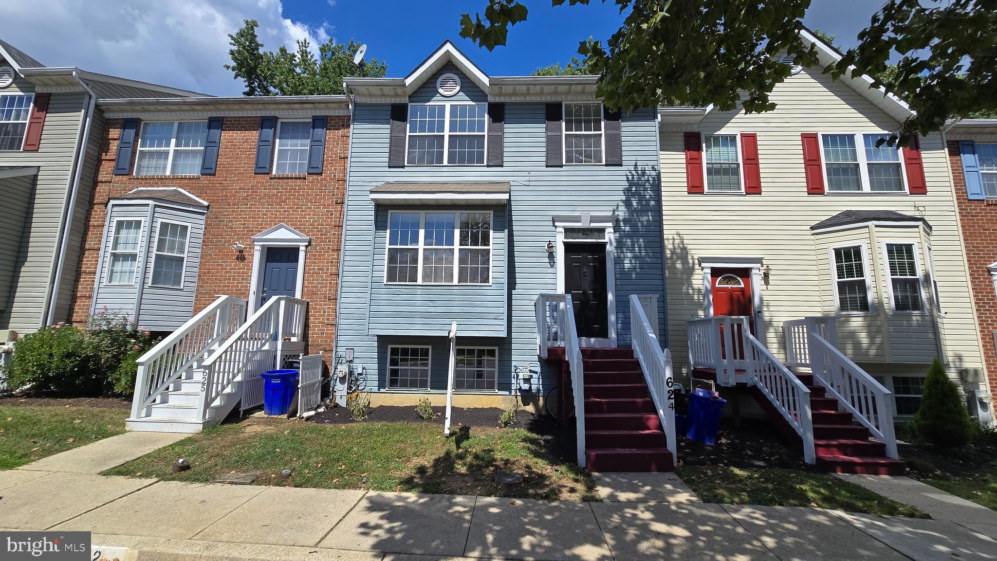 This beautifully updated four-bedroom, three-full and one-half bath interior unit townhome is located in the Oxford Landing community of Annapolis. This home has been refreshed with new landscaping and exterior lighting that enhance its curb appeal. Step inside to a foyer with new hardwood floors that extend throughout the main level. The kitchen is a chef's delight, featuring a charming box/bay window, new white cabinetry with brushed nickel hardware, and stainless-steel appliances. The open-concept living and dining area provides the perfect space for entertaining and features sliders that lead to a deck with steps down to the rear yard. The upper level with new carpeting offers a primary bedroom with a generous walk-in closet and an updated en-suite bath. Two additional bedrooms and an updated full hall bath complete this level. The versatile lower level, also with new carpeting, includes a cozy den with recessed lighting, a fourth bedroom or recreation area, a laundry/utility room and an updated full bath, providing flexible space for guests or family. Conveniently located for an ideal lifestyle, this community offers plenty of green space, a strong sense of community and easy access to downtown Annapolis and Chesapeake Bay's attractions