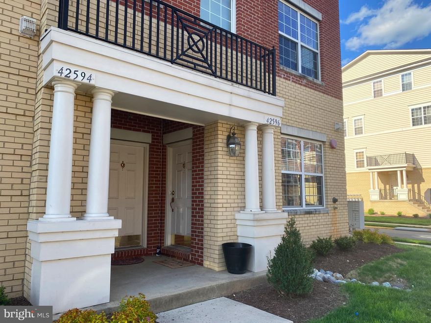 Stunning end unit w/ garage in the heart of Brambleton. Enjoy the numerous community amenities: multiple pools, parks, tot lot, walking paths,  tennis courts and volleyball court just to name a few. Walk to Brambleton Town Center and enjoy multiple restaurants, movie theater, Brambleton Library, and so much more!  Open layout with stainless steel appliances, granite countertops, hardwood floor on main level and new carpet on the upper level. Light fills the space and adds an extra touch to the already larger sized bedrooms.  Take a seat and relax on your own private balcony off the master bedroom. Master bedroom has two walk in closets, double vanities, soaking tub and shower. f