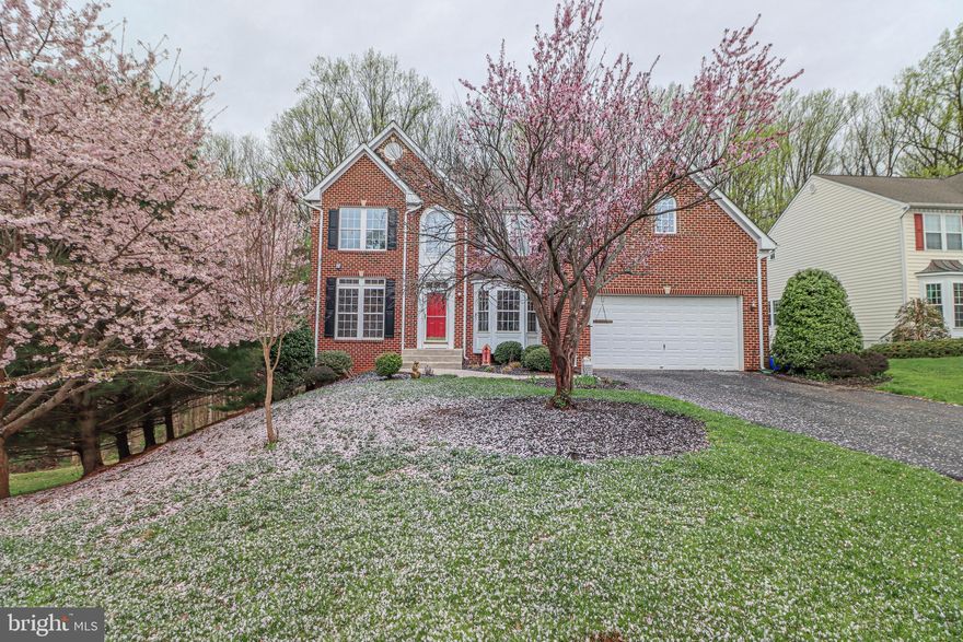 SELLER HAS ACCEPTED OFFER & WE ARE IN THE PROCESS OF RATIFICATION*Welcome to this exquisite 4-bedroom, 2.5-bathroom residence that seamlessly blends elegance with comfort. As you step into the dramatic two-story foyer, you're greeted by gleaming hardwood floors that extend throughout the main level. The separate living and dining rooms offer sophisticated spaces for entertaining, while the main-level office provides a quiet retreat for work or study.​

The heart of the home is the gourmet kitchen, boasting granite countertops, stainless steel appliances, two pantries, and ample space for a kitchen table. Adjacent to the kitchen, the sunroom features a wall of windows, bathing the space in natural light and offering picturesque views of the wooded backyard. The cozy family room, highlighted by a stone gas fireplace and recessed lighting throughout, creates an inviting atmosphere for gatherings.​

Upstairs, the expansive master suite is a true sanctuary, complete with two walk-in closets and a grand 5-piece master bathroom. Three spacious spare bedrooms and a convenient bedroom-level laundry room complete the upper floor.​

The unfinished walk-out basement presents endless possibilities, with ample space for additional bedrooms and a full bath rough-in. Outdoor living is equally impressive, featuring a composite deck overlooking serene woods and a stone patio, perfect for relaxation and entertaining.​

Don't miss the opportunity to own this remarkable home that combines luxurious indoor features with tranquil outdoor spaces. Schedule your private tour today!