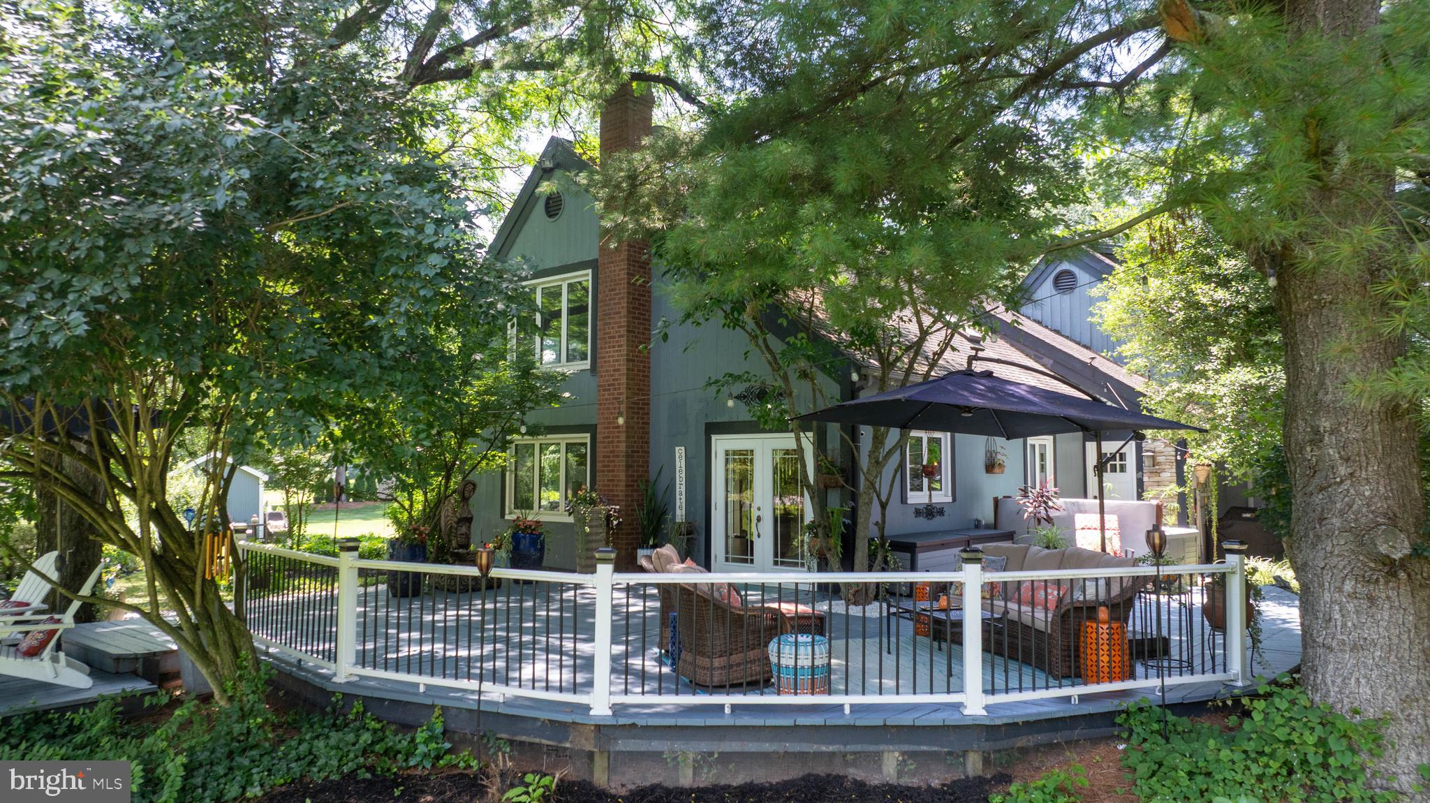 Style, Space & Serenity on 2+ Acres -
Some homes just have a vibe—and this is one of them. This stunning 4-bedroom, 3-bathroom home offers the perfect blend of style, space, and comfort in a serene setting - just minutes from Route 222 and downtown Lititz. Beautifully updated and designed, the home sits on 2+ acres of landscaped grounds and features a large wraparound deck—complete with a hot tub and ideal for entertaining or relaxing in nature.
Inside, you'll love the contemporary feel and open flow. The eat-in kitchen features stainless steel appliances and granite countertops, perfect for cooking and gathering, while the spacious living and dining area makes hosting effortless. Radiant heated flooring adds a touch of luxury throughout the primary bedroom, bathrooms, kitchen, and family room.
A flexible bonus room offers even more space for whatever fits your lifestyle: a cozy movie lounge, stylish home office, or fifth bedroom.
Whether you're enjoying a quiet evening indoors or soaking in the view, this is the kind of place that feels just right, truly a dream to call home.
Many of the home’s furnishings are also available for purchase—offering buyers an opportunity to move into a space that’s not only beautifully designed, but fully styled to match its modern aesthetic. Ample storage throughout the home, including generous closet space and versatile indoor storage areas.