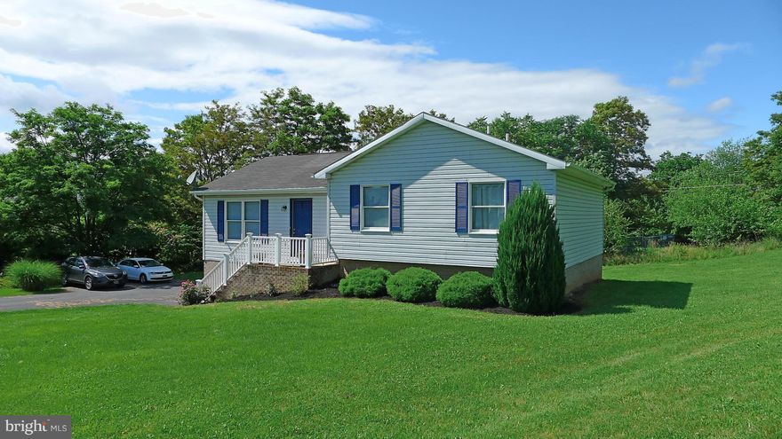 Bright & tidy raised ranch home on almost 1/2 acre  lot in a quiet cul de sac. Private backyard with a deck and nice playset that conveys. Very nice layout with a Big kitchen and living room, master Br with bath, 2 car garage and basement that is almost finished.  Hedgesville school district.  In good shape and should go all loans: zero down USDA, FHA, VA.