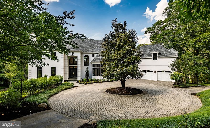 https://my.matterport.com/show/?m=F7XtoWJNaE4&mls=1Beautiful, stately, and completely private, this breathtaking French Manor home is situated on approximately 3 acres in prestigious Penn Valley, Lower Merion Township. This show stopping  home has been completely rebuilt by one of the area s most prestigious family owned home builders, DEG Builders.   The Geib family has missed no detail in their effort to raise this property to a condition that surpasses its original splendor.    Features include a modern open floor plan, old world craftsman level millwork, 5 bedrooms, 5 full baths, 2 half baths , 4 fireplaces- with over 7,000 square feet of finished living space of which 1652 sq. ft. are in the awesome  in walk out lower level!. Enter this estate home down a private lane which leads to a magnificent hardscape circular driveway and huge 3 car garage.   The all new black windows contrast nicely against the crisp white stucco walls.   Upon entering, you will be amazed by the magnificent two-story grand entry foyer with granite floors, all new hardwoods, and filled with an abundance of natural light. Step down into the voluminous family room w/ black slate fireplace, and stunning views. Step into the all new gourmet kitchen with quartz countertops, Wolfe range and Sub Zero Refrig. and awesome island. The first floor library is huge and features a fireplace framed with built-in cherry woodwork and wet bar.  Enjoy the views on the multi-level deck directly off the kitchen and family room. Step down into the finished lower level with walkout, fireplace, wet bar, 5th bedroom, and a full bath. Head up the main staircase to the 2nd floor, which boasts 4 large and bright bedrooms - each with its own private full bath, and second floor laundry.  Enjoy the spacious and private master bedroom with his and her walk-in closets and huge all new spa like master bath.  This home features 3 zoned heat and air, with a back staircase and service entrance.   Great location, that can put you on Rt.76 in 5 minutes, and into the city in 15 to 20 minutes!! It is also located in close proximity to rail service. It is a must see!  Don't miss out on this wonderful opportunity!!