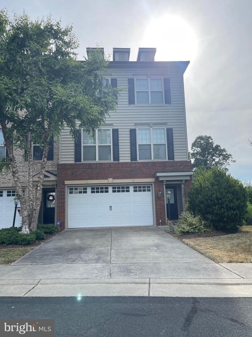 4 Level Brick End Unit Town home in a very good condition with over 3000 sqft finished. 4 bed/3.5 bath, 2 car garage , lots of windows. Main level bedroom with full bath and den. Hardwood floors, eat in kitchen, Granite countertops, Steel Appliances and Covered deck on two levels, patio. Large Master bedroom with Tray ceiling. Finished lower-level backing to woods. School bus stop is at the entrance of the community which is 30 seconds walk from the home. Community amenities include Kids play area, guest parking, basketball court and much more. Easy access to Silver line Metro, major commuting routes and shopping. Pets allowed on a case by case. Smoking is not allowed. Available to occupy from 08/01/2025 or some flexibility to move a little sooner.