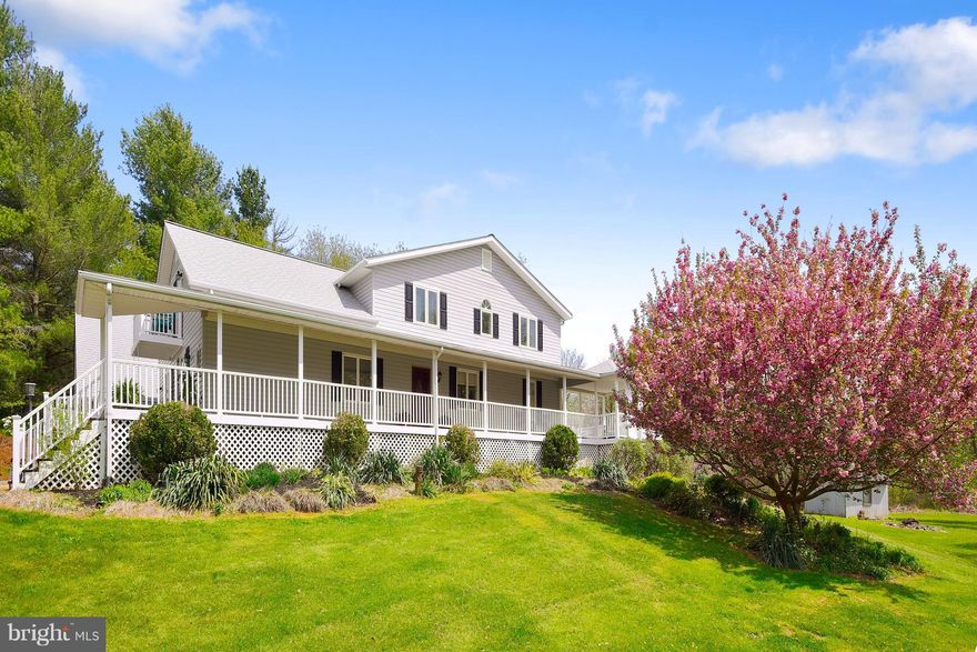 Unique 4 BR colonial  on 3.82 acres w/ stream.Lg open kitchen w/ breakfast room...LR w/gas FP,sun room w/pellet stove, FR, formal DR w/ HW floors.Master BR w/ balcony and walk in closets.Master BA and hall BA w/ separate shower and jacuzzi Office w/ kitchenette and full bath over 2 car heated garage w/ separate entrance.2 decks,gazebo and  shed.More under docs!