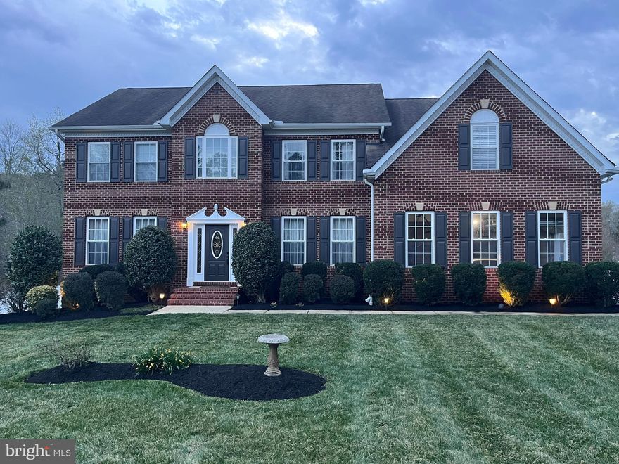 Welcome to this stunning 5  Bedroom, 3 Full Bath Colonial in the desirable Forrest Farm Subdivision.  This elegant home offers space, style and thoughtful updates throughout.  The impressive Brick Front, Side-Load 2 Car Garage, and long blacktop drive way provide beautiful curb appeal.  Located at the end of a quiet court, the property features a fully fenced back yard with a storage shed complete with electricity and running water, along with an in-ground sprinkler system.  Inside you will find a great 2-story foyer with a split staircase.  The dining room feature marble floors, while hardwood flooring and ceiling fans add warmth throughout the home.  The spacious kitchen provides tile flooring, and an eat-in area, and a built-in office nook, all over looking a bright Florida room-perfect for everyday living or entertaining.  The great room features vaulted ceilings and a cozy fireplace, creating an inviting gathering space.  The main living suite includes a private sitting room and a luxurious en-suite bath with double sinks, a separate shower, a soaking tub, and a bidet.  Additional highlights include central vacuum and access to a community pool, making this home the perfect blend of comfort and convenience.