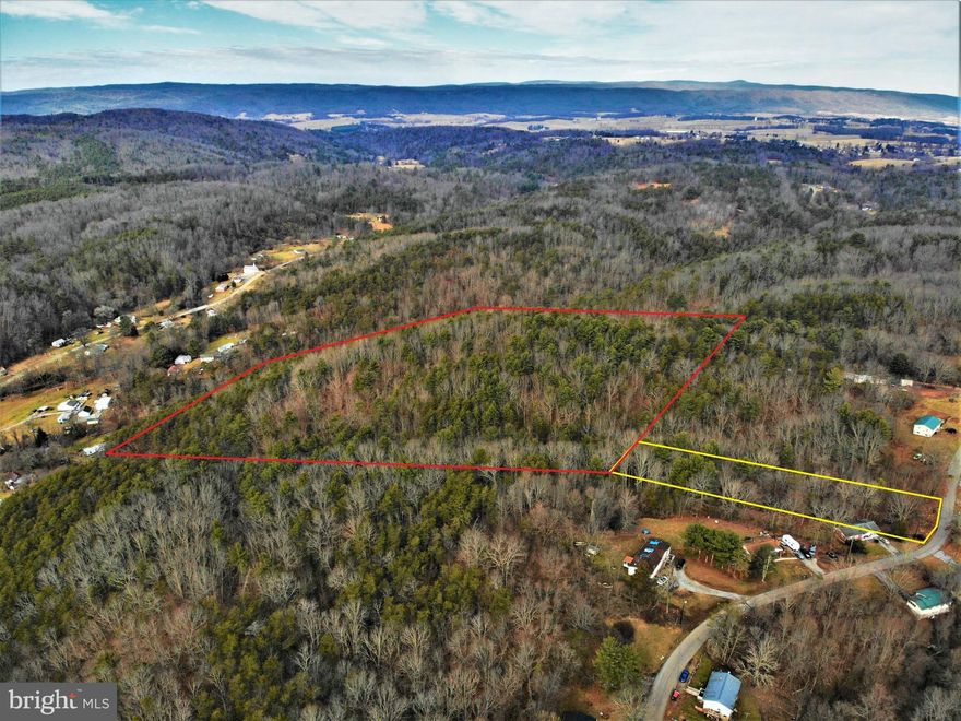 15 Beautiful acres of prime residential and recreational land in Pulaski County VA! Just north west of the town of Pulaski VA, you get a chance to own a rare offering on 15 acres with spectacular views and incredible outdoor tranquility! The property has an old road bed that runs from Thaxton road all the way to the highest peak of the property where there is a great homesite potential with a view! The owner cleared a nice camping spot along the road bed giving easy access for enjoying the property with the family! Whether you intend to build or just camp or hunt, this property is big enough to do it all! Several creeks and streams run through and adjoin this property providing peaceful sounds and abundant wildlife habitat. The property features excellent timber for both wildlife habitat as well as potential timber harvest income, if desired. With a mixture of large mature VA and Shortleaf pines as well as a combination of hardwoods that range from pulpwood to sawtimber size. The deer sign and activity on this property is excellent and makes for a prime hunting property. Harbison Creek is on the western boundary which creates a natural travel corridor bringing plenty of wildlife in, on, and around this property to feed on the acorns produced by the abundant Oak trees on the property!
With just a small homesite clearing, you could open up the view on the top of the hill to enable an incredible view overlooking the mountains to the west. And if you’re paying attention to directions in this description, then that means you know what “west” means...Sunsets! Nothing beats a mountain sunset while sitting on your back deck! This property has “dream home” written all over it! Call today to learn more!