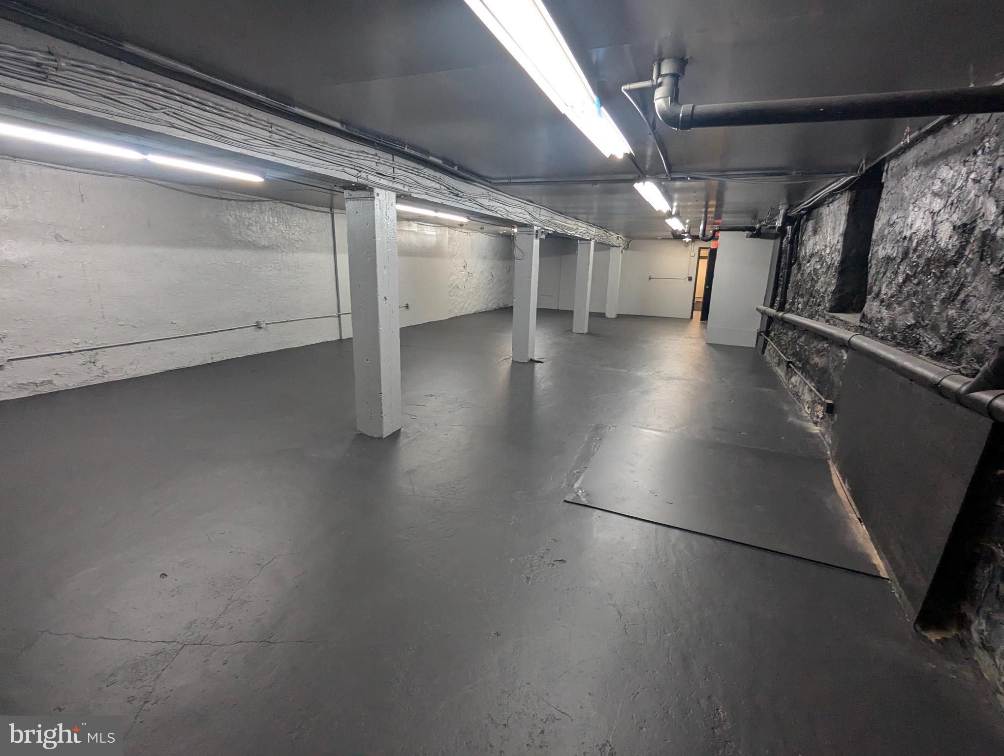 Large open space with 9' ceilings, ideal for clubs, fitness and production spaces. Two entrances, space is located on lower level. Freshly painted, and efficient natural gas heat.