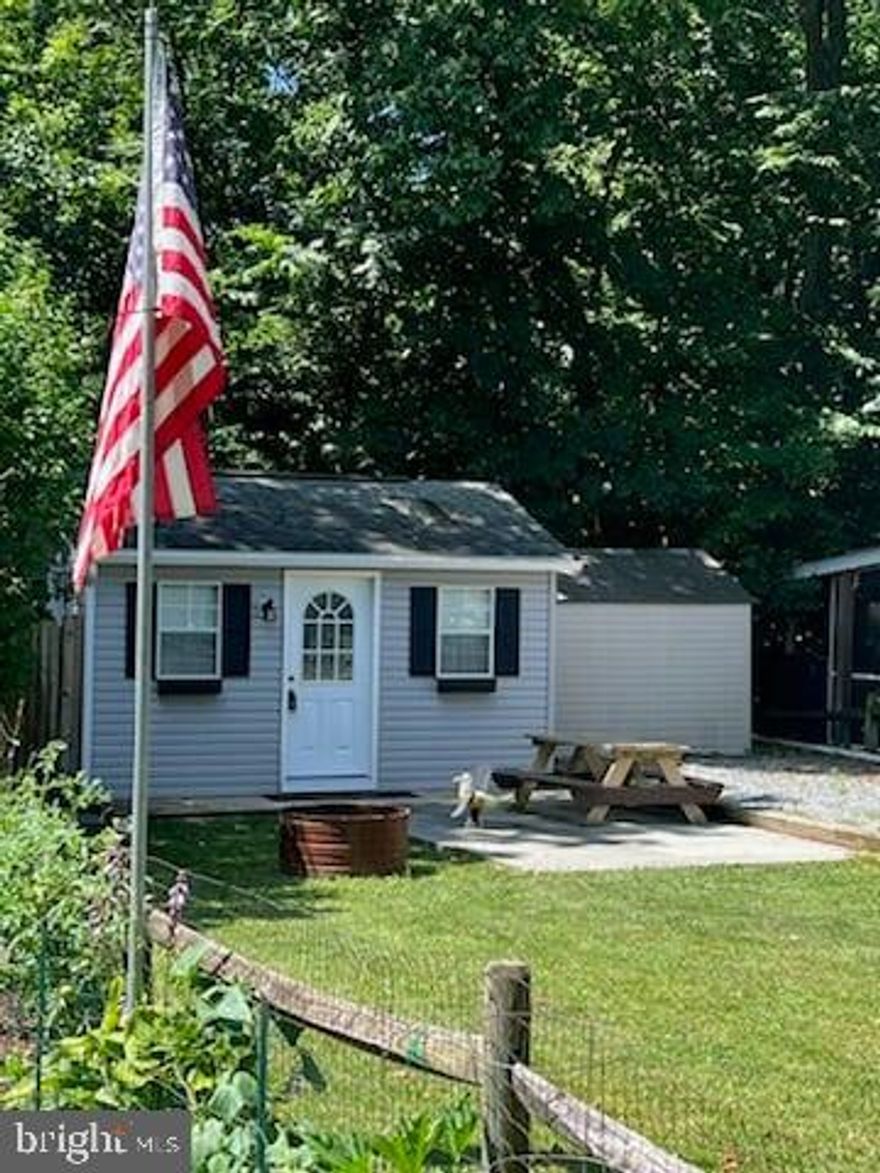 This property in River Bend features a large partially shaded lot with ample space to park campers and/or toys. The 12 x 16 shed was converted to living space, which has: insulated walls, electric, lighting, window unit, microwave, TV and a bed. There is also an additional 8 x 10 shed and a concrete pad which is fenced for storing your toys.