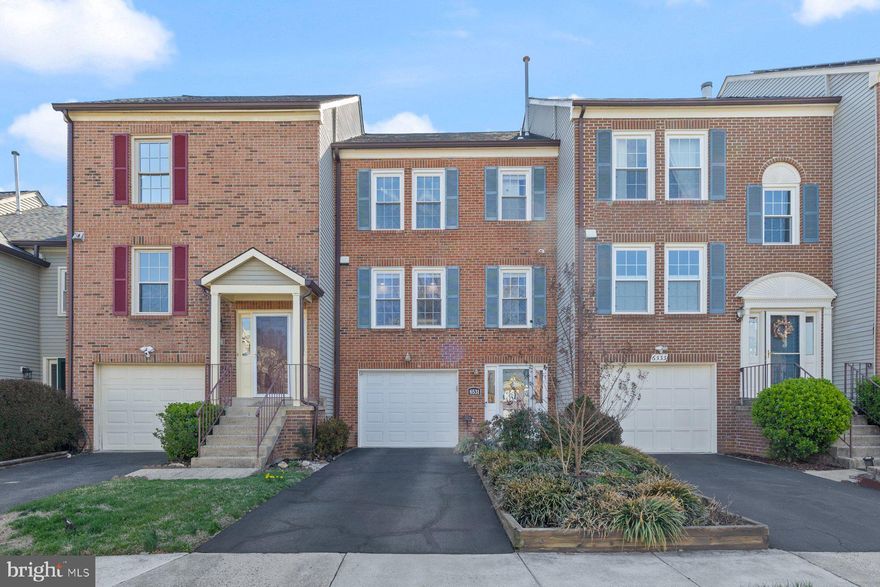 Welcome to this beautifully updated 3 bedroom, 3.5 bathroom townhouse with 1 car garage in a prime location that truly has it all! A bright & welcoming home featuring soaring ceilings & a unique 6-level floor plan. Freshly painted & move in ready! The main level showcases a bright and open-concept living and dining area w/warm hardwood floors throughout, complemented by a cozy wood-burning fireplace, ceiling fans, and plenty of natural light. A convenient pass-through opens to the kitchen, creating a seamless connection between spaces. The kitchen is a true highlight, featuring stainless steel appliances, granite countertops, white cabinetry, and recessed lighting that creates a bright and modern workspace. A generously sized pantry offers excellent storage, while the thoughtful layout effortlessly blends everyday functionality with timeless style. Just off the kitchen, a convenient powder room serves guests and enhances daily comfort. From the adjacent living space, double doors open to a nice, elevated deck—an ideal setting for sipping your morning coffee, enjoying quiet evenings, or entertaining under the stars. Upstairs offers three comfortable bedrooms, including a spacious primary suite with soaring vaulted ceilings, a lighted ceiling fan, and mirrored closet doors that reflect the natural light and add to the open, airy feel. From the primary bedroom, step up to a private loft retreat—a versatile space featuring skylights, additional storage, and room for a home office, workout area, or cozy reading nook. The primary bedroom includes its own en suite bathroom with a marble-top vanity, beautiful tile work, and a shower with glass sliding doors. The second & third bedrooms offer beautiful hardwood flooring & overhead lighting, making them perfect for family, guests, home offices, or flexible living space. A nearby full bathroom features a classic shower/tub combo, ideal for both daily use & accommodating visitors w/ease. For added convenience, a full-size washer & dryer are also located on this level, making laundry day a breeze w/out having to go up or down stairs. The lower level is designed for comfort & entertainment, featuring stylish luxury vinyl plank flooring, an extra-high ceiling, and a lighted ceiling fan. Whether you're hosting game night or setting up a cozy movie area, this level offers the flexibility to fit your lifestyle. Double doors lead to a lower-level deck & brick patio, extending your living space outdoors to a fully fenced backyard—perfect for pets, play, or peaceful relaxation. Backs to common area and golf course.  A full bathroom with a stand-up tiled shower and tiled flooring adds both function and style to this level, making it ideal for guests or multi-generational living. This home has been meticulously maintained, featuring updates such as a new roof w/50 yr shingles, gutters, downspouts, and skylights in 2018; a new HVAC system with 3 zones & rerouted lower-level ductwork in 2019; new hardwood flooring on the stairs, bedrooms, and loft in 2020. In 2021, basement was upgraded w/LVP flooring. Renovated primary bathroom in 2022.  In 2023, water heater was replaced & both the guest bathroom and the kitchen cabinetry were beautifully updated. In 2024, a new refrigerator w/ice maker and water filter was installed. House feeds to highly ranking schools: Columbia Elementary, Holmes Middle, Annandale High. Home is also walking distance to Thomas Jefferson High School for Science & Technology. The Pinecrest HOA fee includes: Common Area Maintenance, Snow Removal, Trash, Jog/Walk Paths, Tennis & Pickleball Courts, & Tot Lots/Playground. There is a 1 car garage, driveway parking, and plenty of guest parking. Walk to restaurants, grocery, Starbucks, Green Spring Gardens, Pinecrest Golf Course, & Mason District Park. Perfectly located inside the beltway between 395 & 495. Easy access to DC, Tyson's, and Alexandria. Located on Metro Bus express routes to the Pentagon. Make your appointment today!