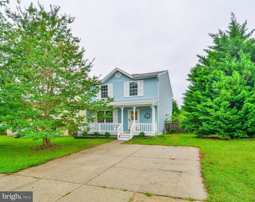 Welcome Home!This lovely porch front colonial style home has just been freshly updated and is ready and waiting for its new owner! The home offers new flooring throughout, an updated kitchen w/Corian countertops, stainless appliances, finished basement, sunroom, deck and a fenced in yard. The back yard offers lot of privacy and backs to trees and a protected park area. HMS One Year Home Warranty!