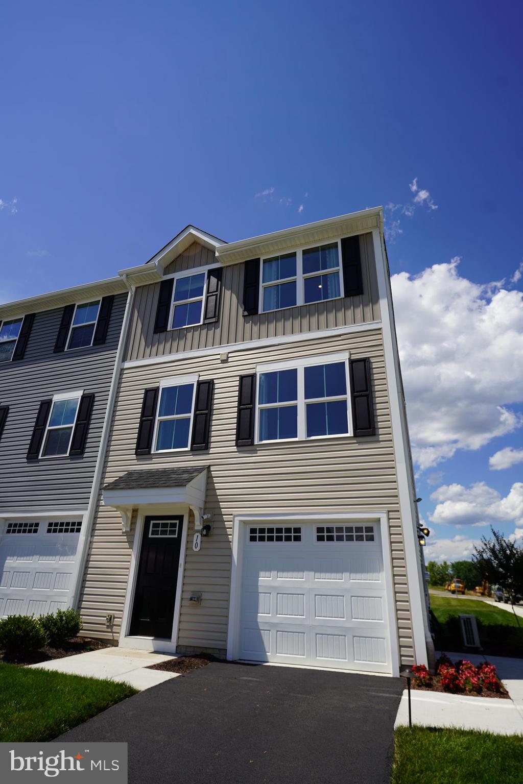 Current Model home for Ryan Homes! This 3Bd, 2.5BA end unit townhouse features a one car garage, finished basement, open floor plan on main level with spacious kitchen and generous counter space, seperate dining area, large family room, and a master bedroom en suite, two spare bedrooms! Closing must be after July 31.