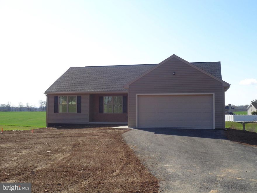 New construction on the outskirts of Carlisle. 1380 sq. ft. living space on main floor, includes 3 bedrooms, 2 bathrooms, open concept kitchen/dining, living room. Porcelain tile flooring & carpet in bedrooms. Walk in closets. Granite countertops- walk out basement (unfinished). Leaves many options for more living space. Trex deck outside. Dining room leads down to large patio area to sit and enjoy the countryside. Property to be reassessed upon sale of property. Peat-moss septic system.