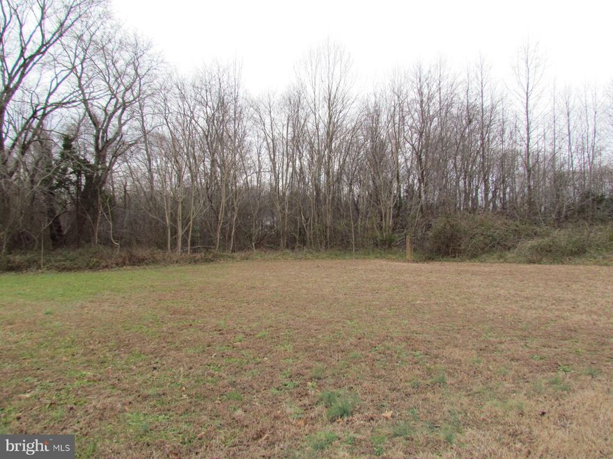 Build your dream home on this 2.1 acre level lot.