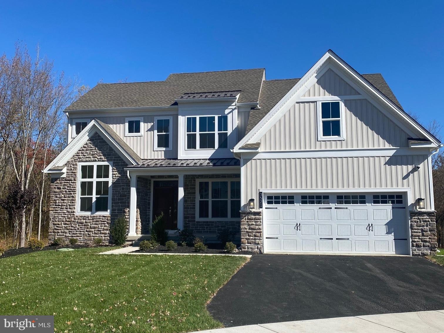 Laurel Crossing, W.B. Home’s highly anticipated community of estate homes in Chalfont, PA, located in the premium Central Bucks School District with easy access to an array of shopping, dining and recreation, Laurel Crossing is conveniently located along County Line Road in Warrington Township. Residents of the community will enjoy the tranquility of living in a serene neighborhood while remaining close to major urban areas, with quick accessibility to Routes 309, 202, and 611.
First floor living at its finest; welcome home to the Anderson floorplan at Laurel Crossing! Walking through the covered front porch, you’ll immediately be greeted by the impressive 9’ ceilings that run throughout the home. Upon entry, a large foyer will lead you into a spacious flex room—which is perfect for a private study. Also off the foyer is the coveted first-floor owner’s bedroom that is complete with a tray ceiling, dual walk-in closets, and a spa-like ensuite bath with private water closet, dual sink vanity, and spacious shower with solid-surface bench seat. Towards the rear of the home, you’ll find the massive volume ceiling, open-concept great room with included fireplace, that then seamlessly connects to the breakfast area and masterful kitchen. There is a light-filled sunroom off of the breakfast room. The kitchen features a large central island, generously sized pantry closet, and ample cabinetry. Also located on this level is a convenient 1st floor laundry room, access to the two-car garage, and private full bath. Going upstairs, you’ll find three additional bedrooms (one with a private bath) with walk-in closets and a hall bath with double sink vanity. The Anderson floorplan offers both luxury and convenience, with plenty of options that fit your lifestyle needs.